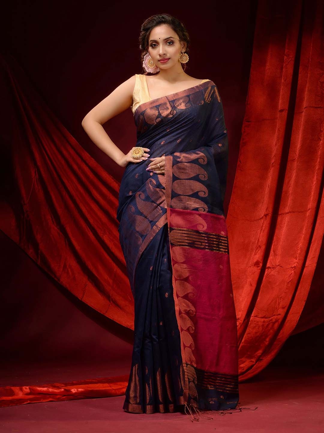 

Charukriti Blue & Pink Woven Design Zari Saree