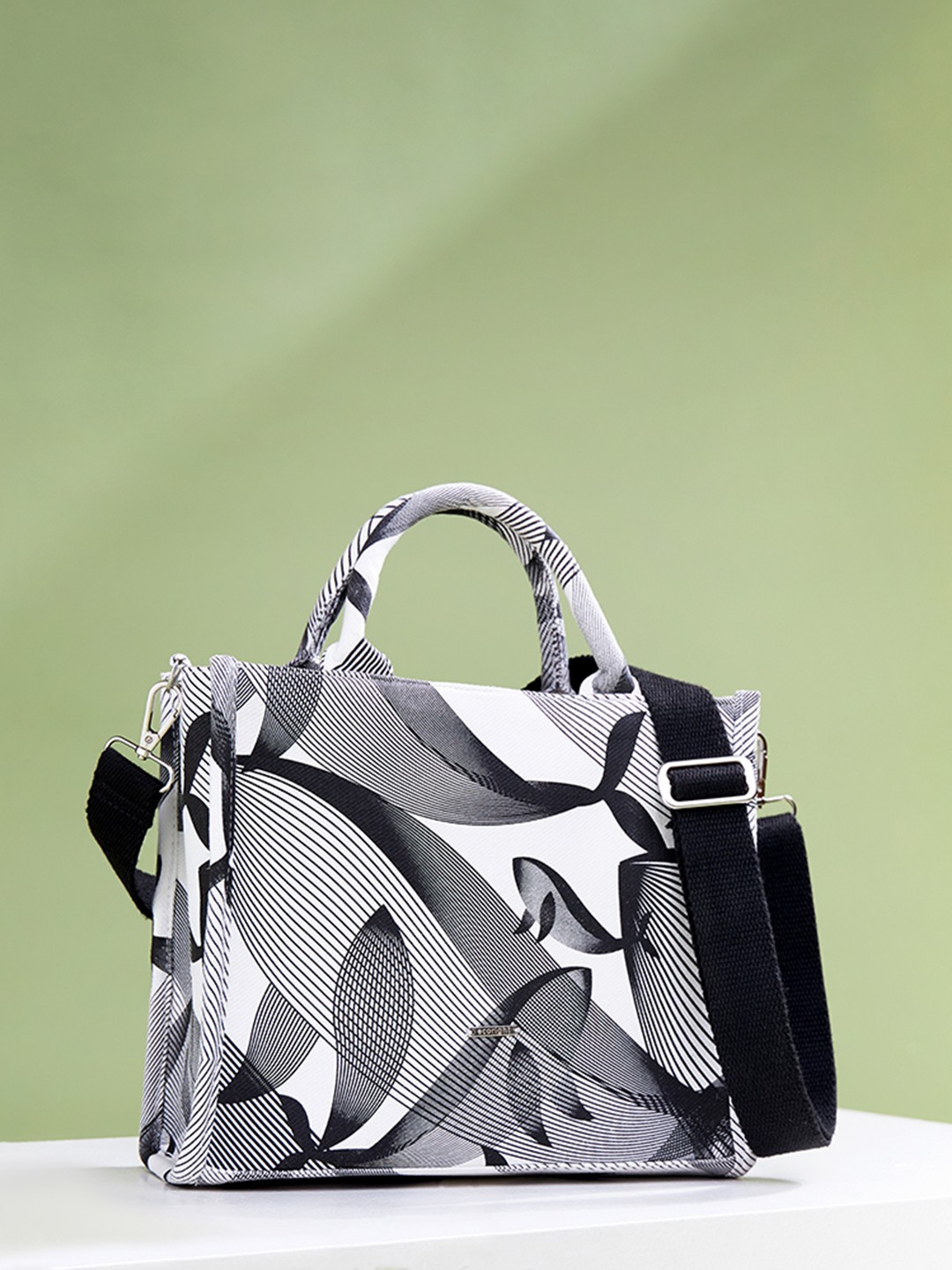 

EcoRight Black Cotton Geometric Printed Swagger Handheld Bag, Off white