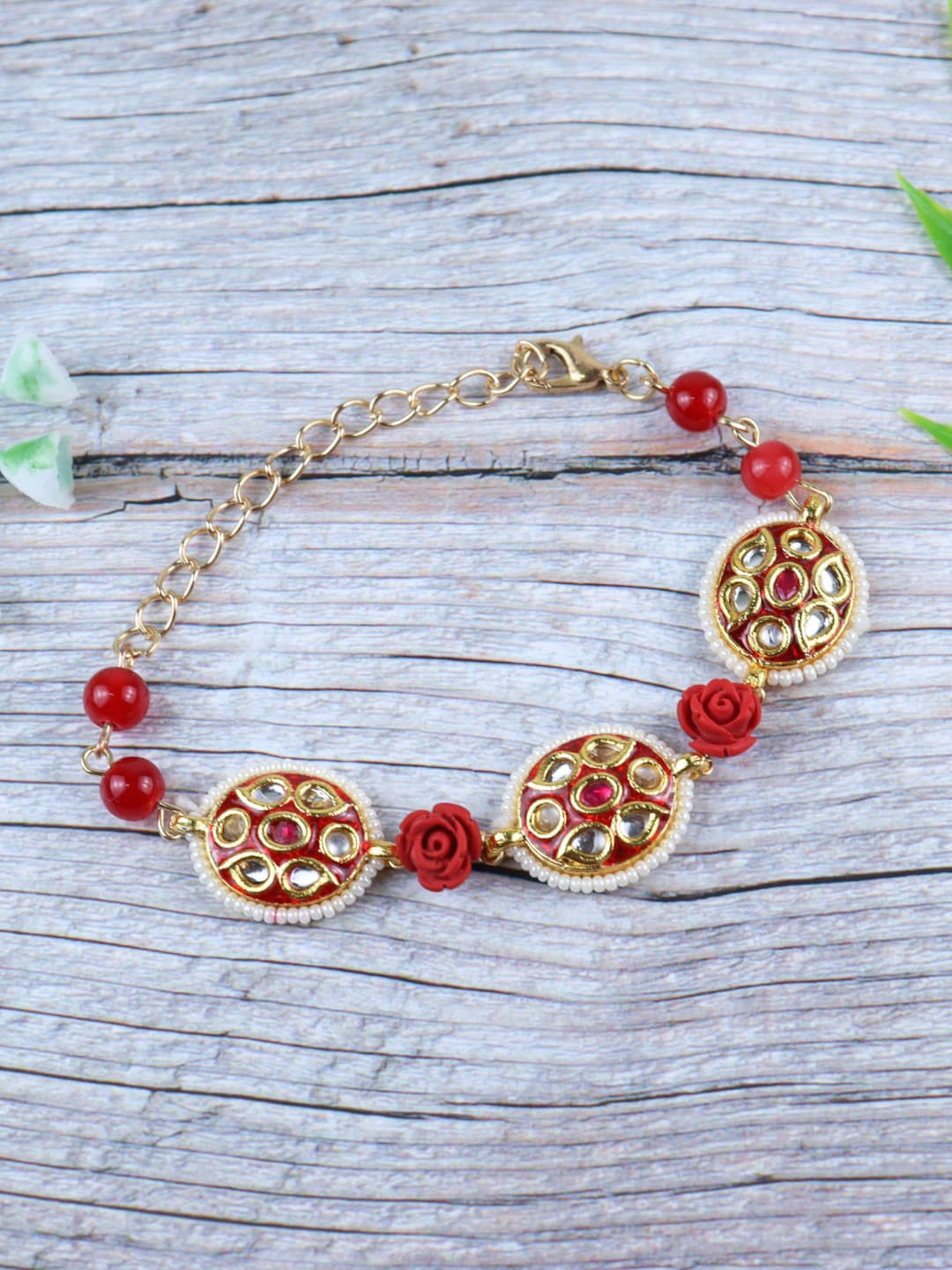 

Asthetika Kids Girls Red & Gold-Toned Kundan Gold-Plated Charm Bracelet