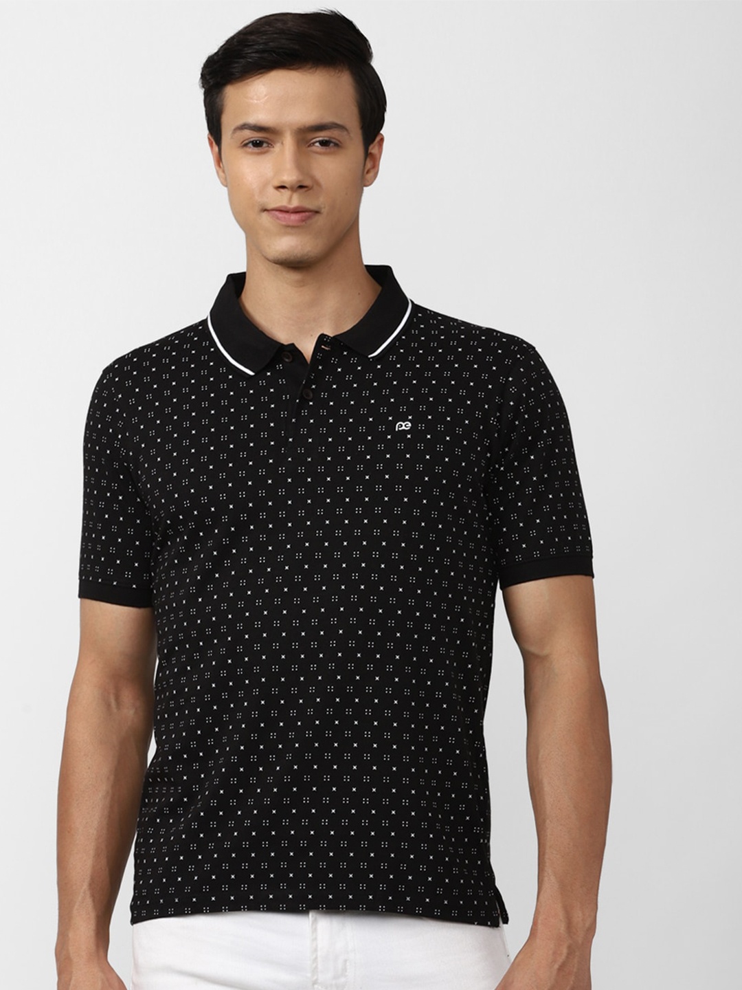 

Peter England Casuals Men Black Printed Polo Collar Slim Fit Cotton T-shirt