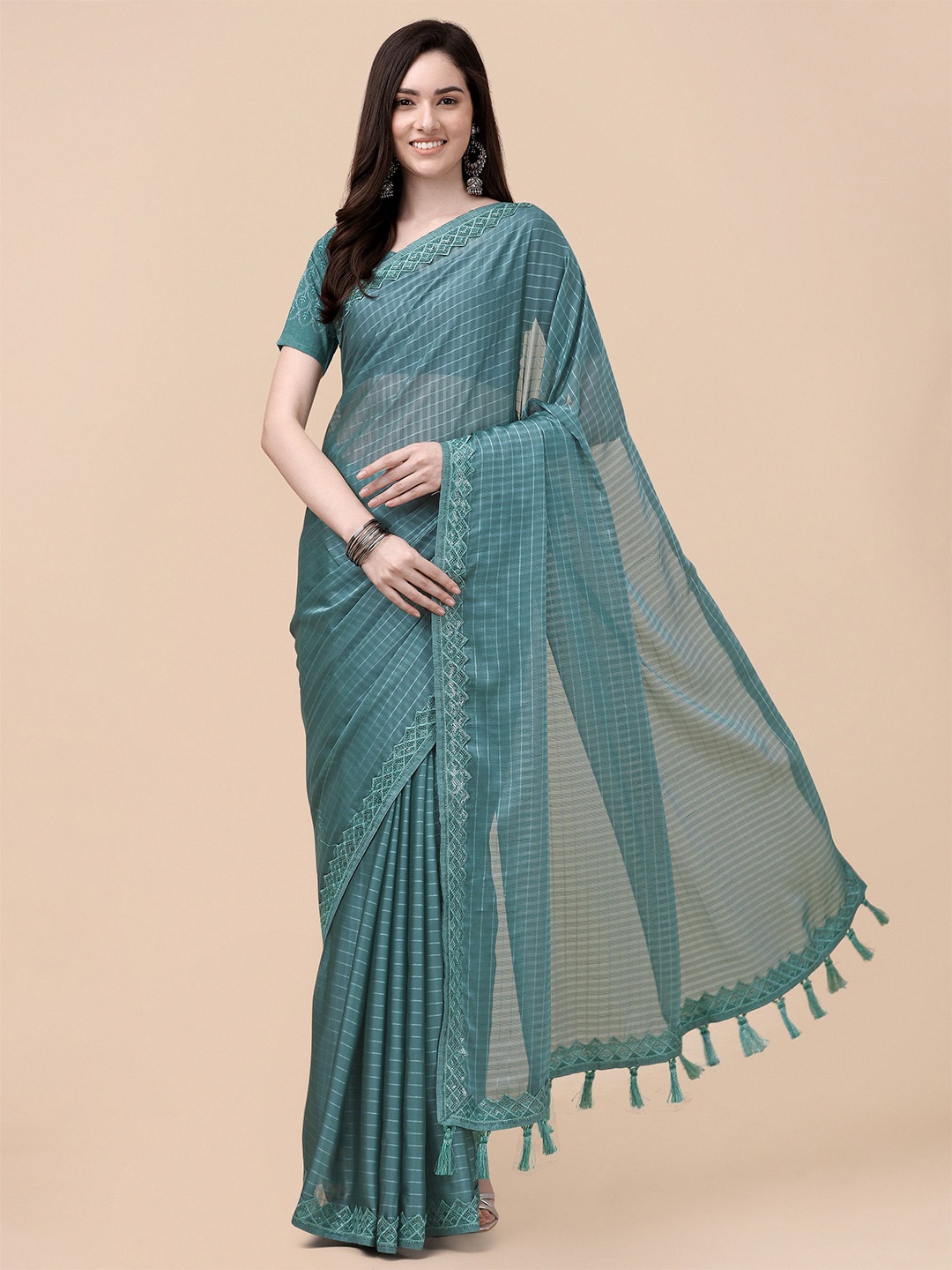 

Mitera Teal Striped Embroidered Pure Chiffon Saree