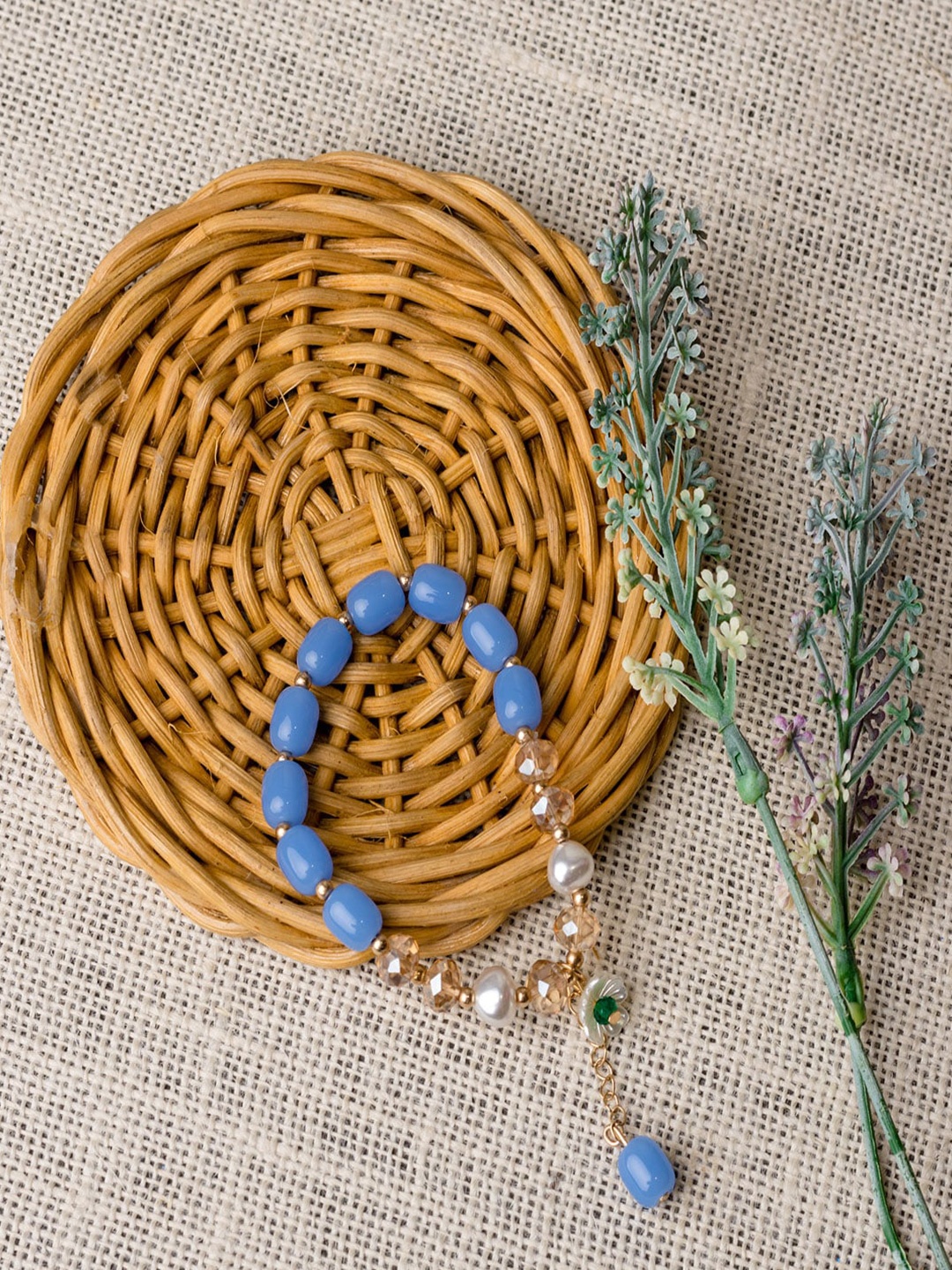

Jewelz Women Gold& Blue Bracelet