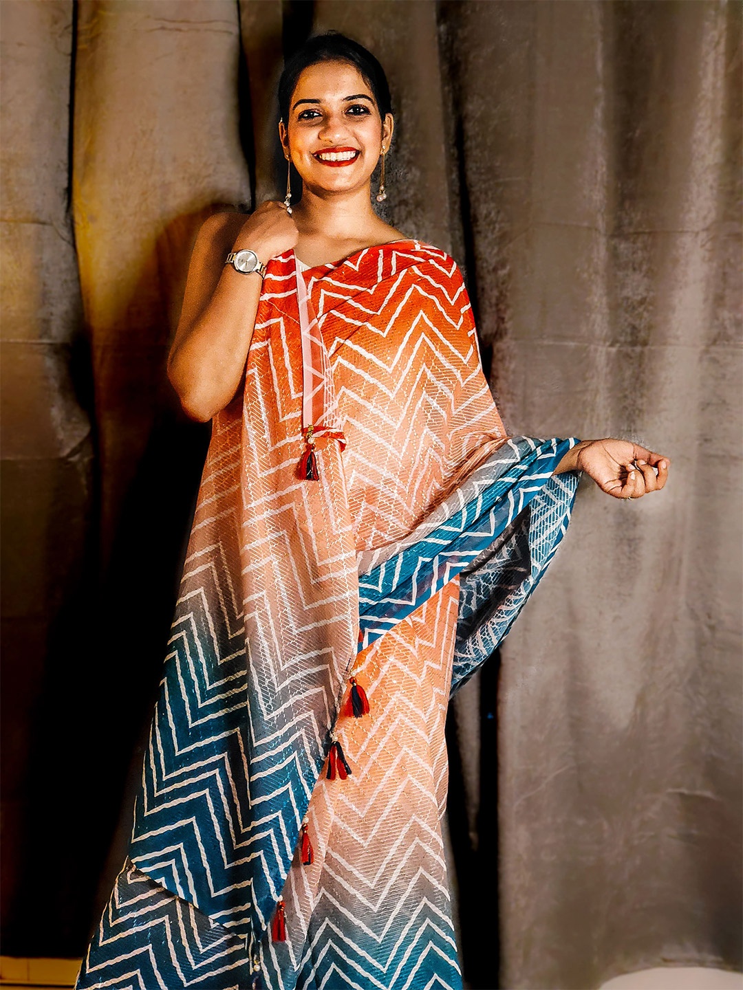 

Apaapi Threads of glory Red & Pink Embellished Sequinned Pure Georgette Saree