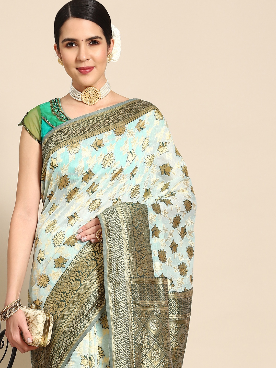 

Chhabra 555 Turquoise Blue Floral Zari Silk Blend Banarasi Saree