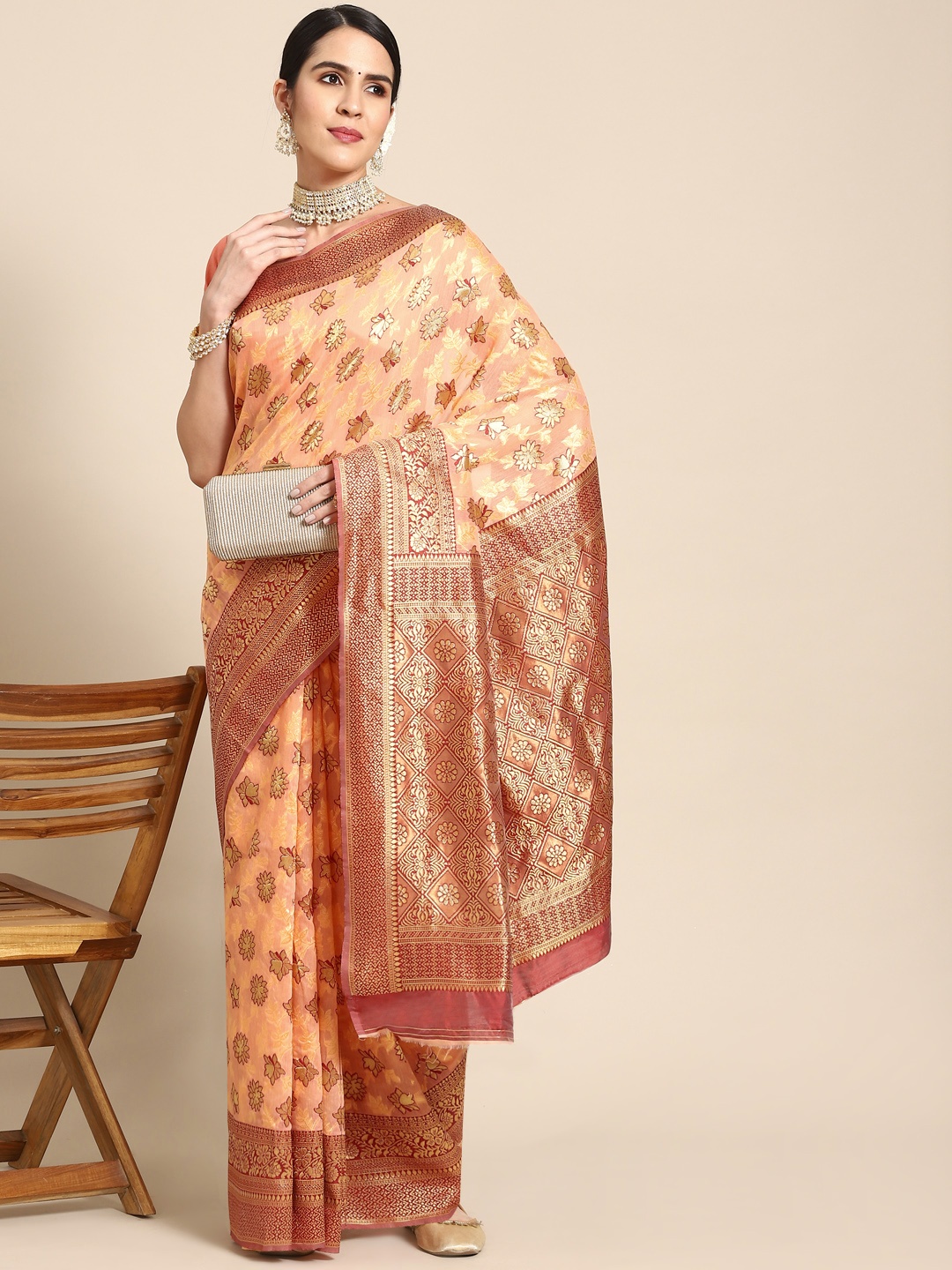 

Chhabra 555 Peach-Coloured Floral Zari Silk Blend Banarasi Saree