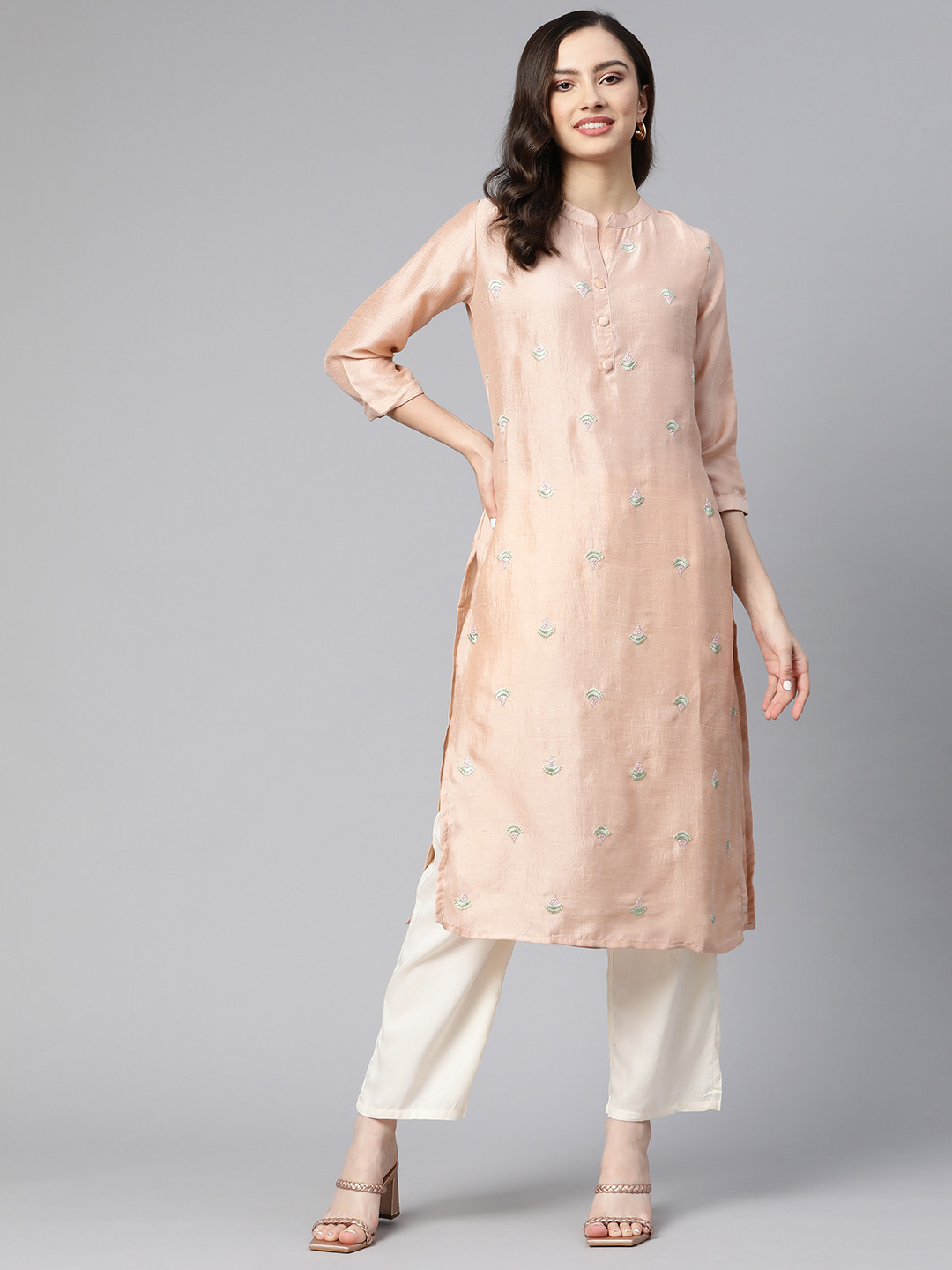 

Readiprint Fashions Women Peach-Coloured Ethnic Motifs Embroidered Thread Work Kurta