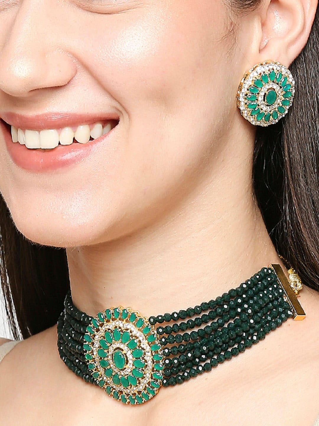 

OOMPH Gold-Toned & Green Kundan Studded & Beaded Jadau Jewellery Set