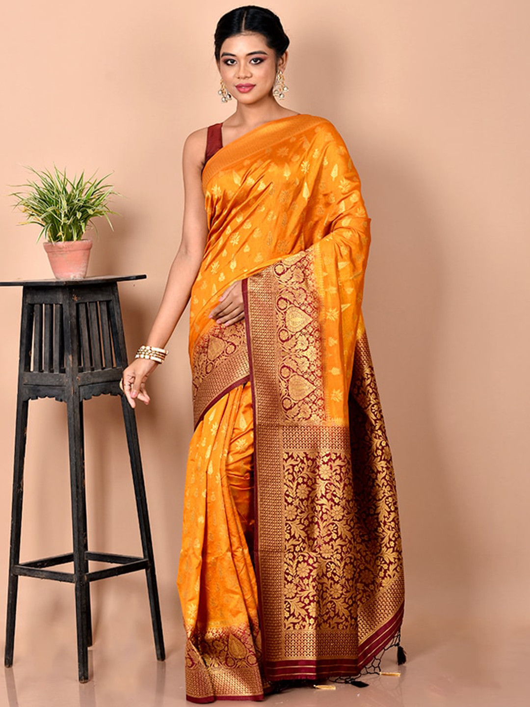 

AllSilks Yellow & Maroon Ethnic Motifs Zari Saree