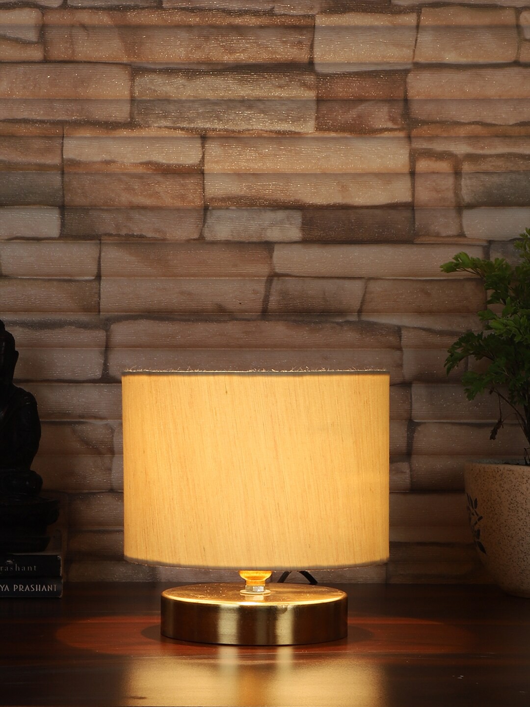 

Devansh Off White & Gold-Toned Textured Cylindrical Table Lamp