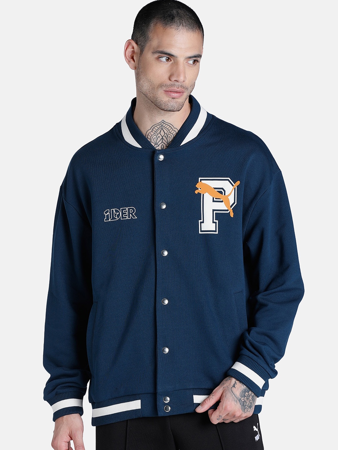 

Puma Men Varsity Relaxed Fit Jacket with Patchwork, Blue