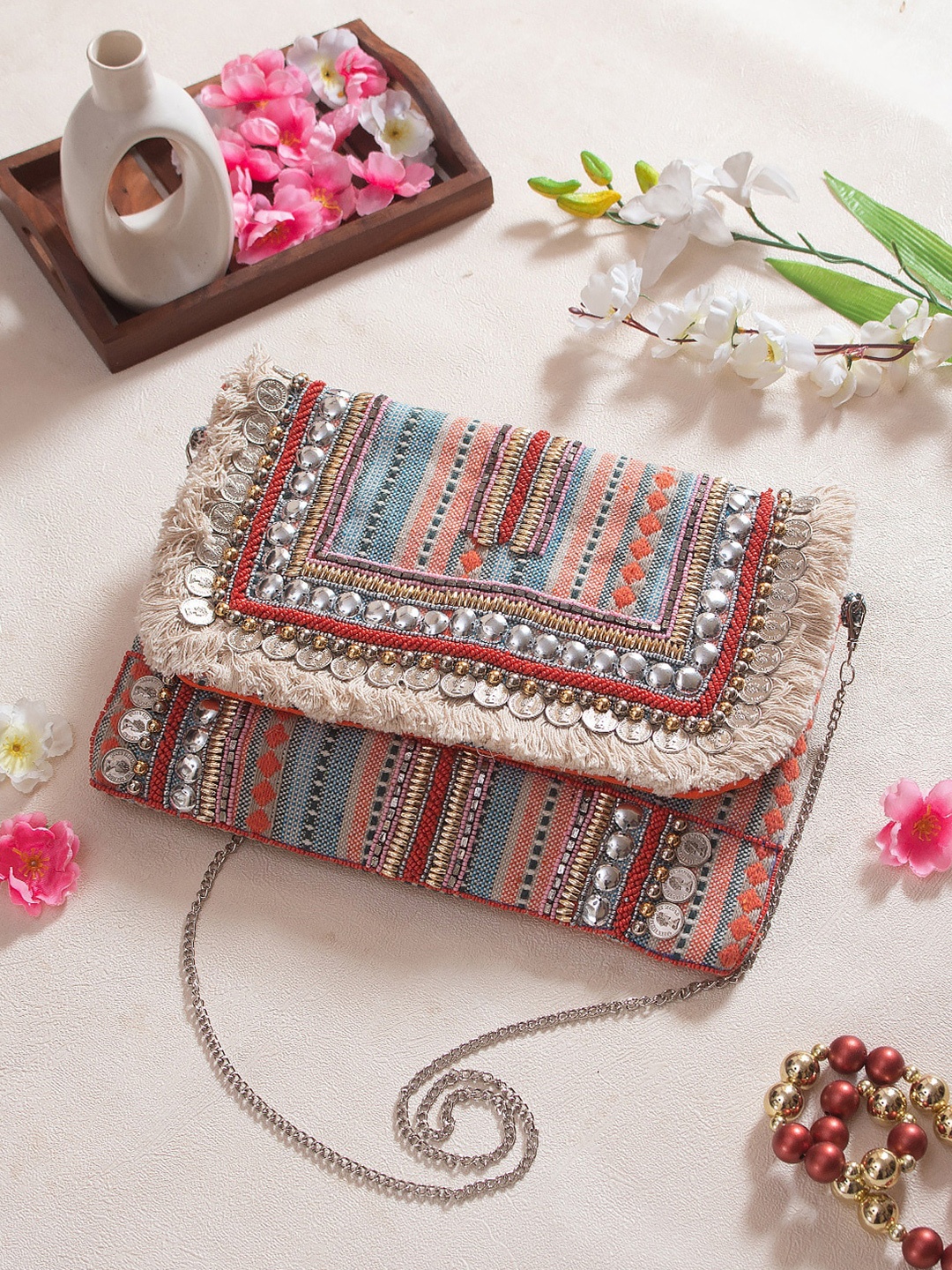 

Swisni Women Orange & White Embellished Fabric Purse Clutch
