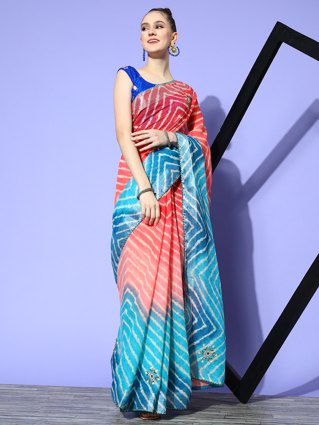 

Chhabra 555 Blue & Peach-Coloure Beads and Stones Leheriya Saree