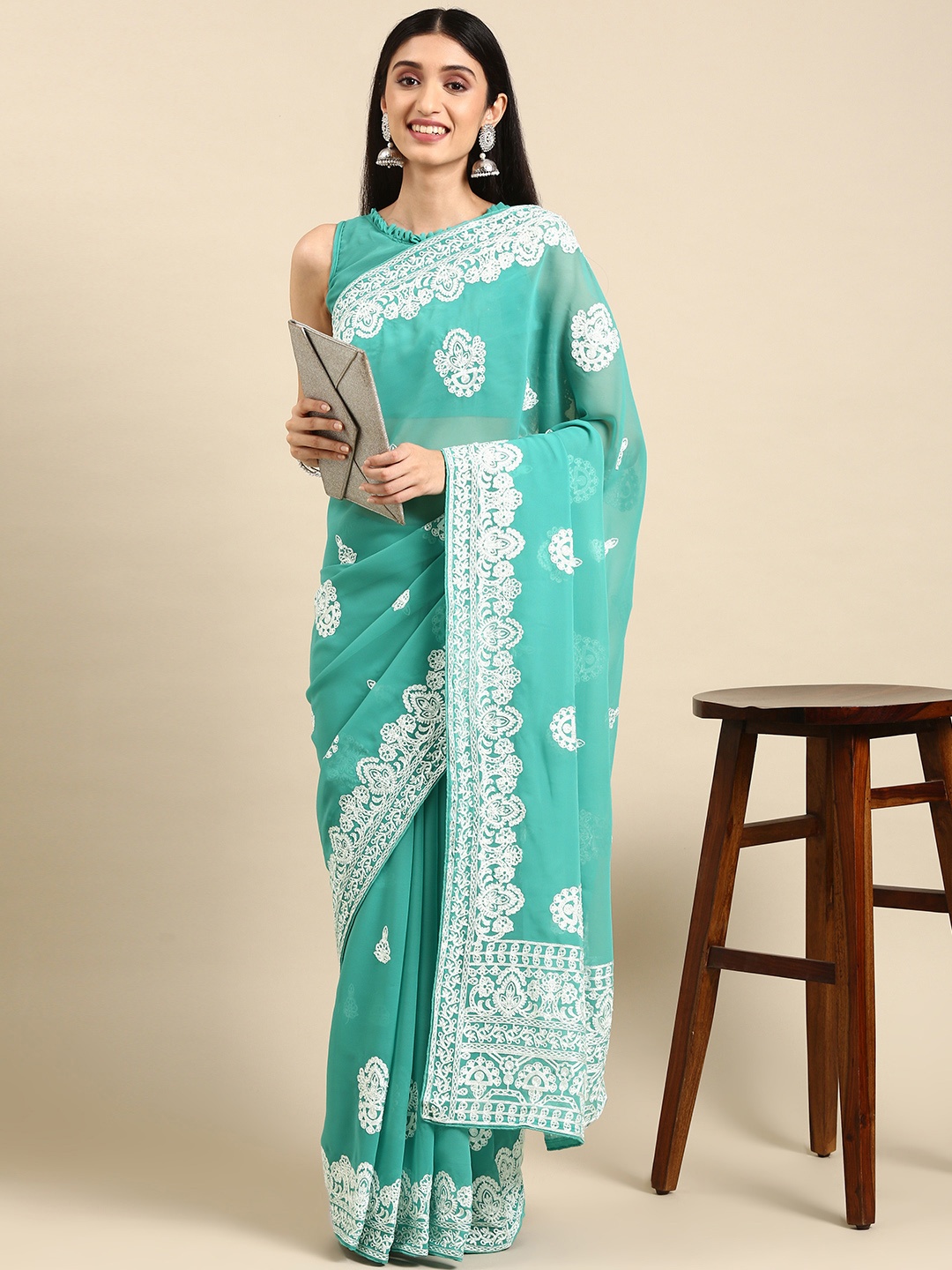 

VAIRAGEE Turquoise Blue Ethnic Motifs Embroidered Saree