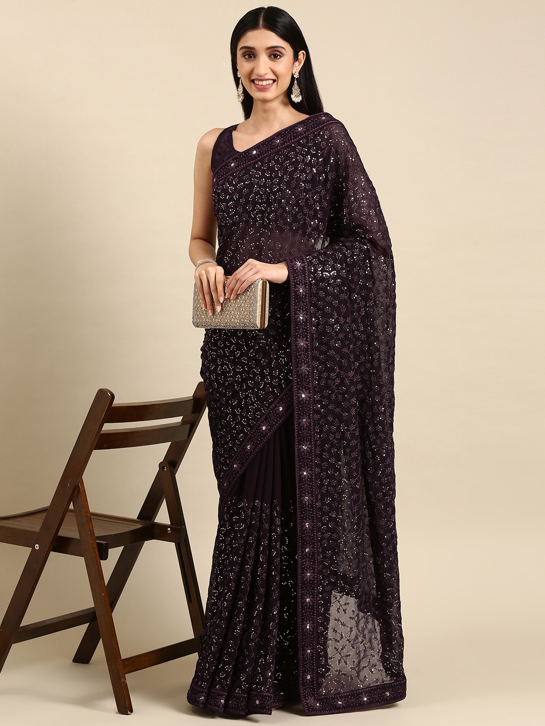 

VAIRAGEE Burgundy Woven Design Sequinned Saree