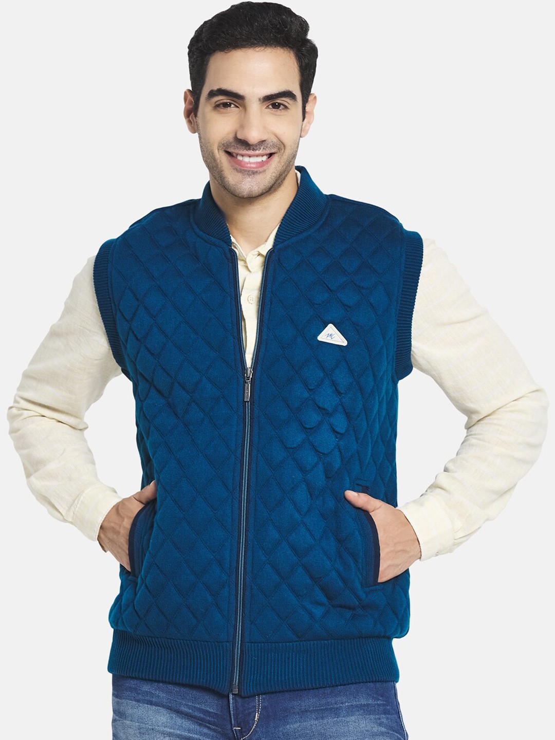 

Monte Carlo Men Teal Solid Sleeveless Sweater Vest