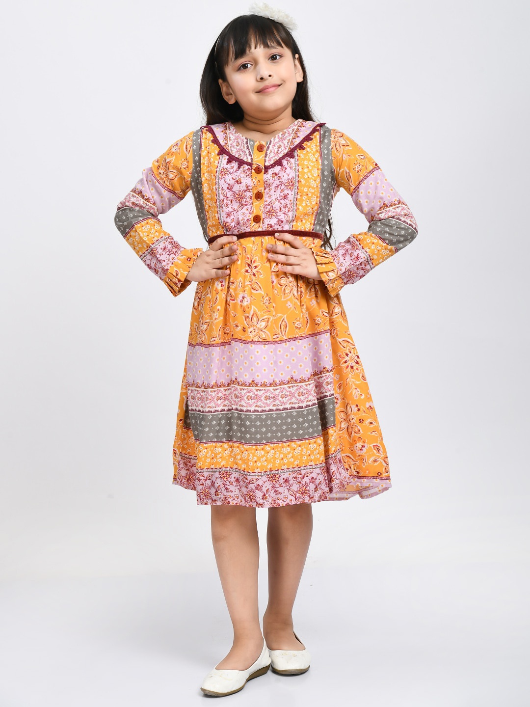 

Bella Moda Girls Mustard Yellow & Grey Cotton Ethnic Motifs Dress