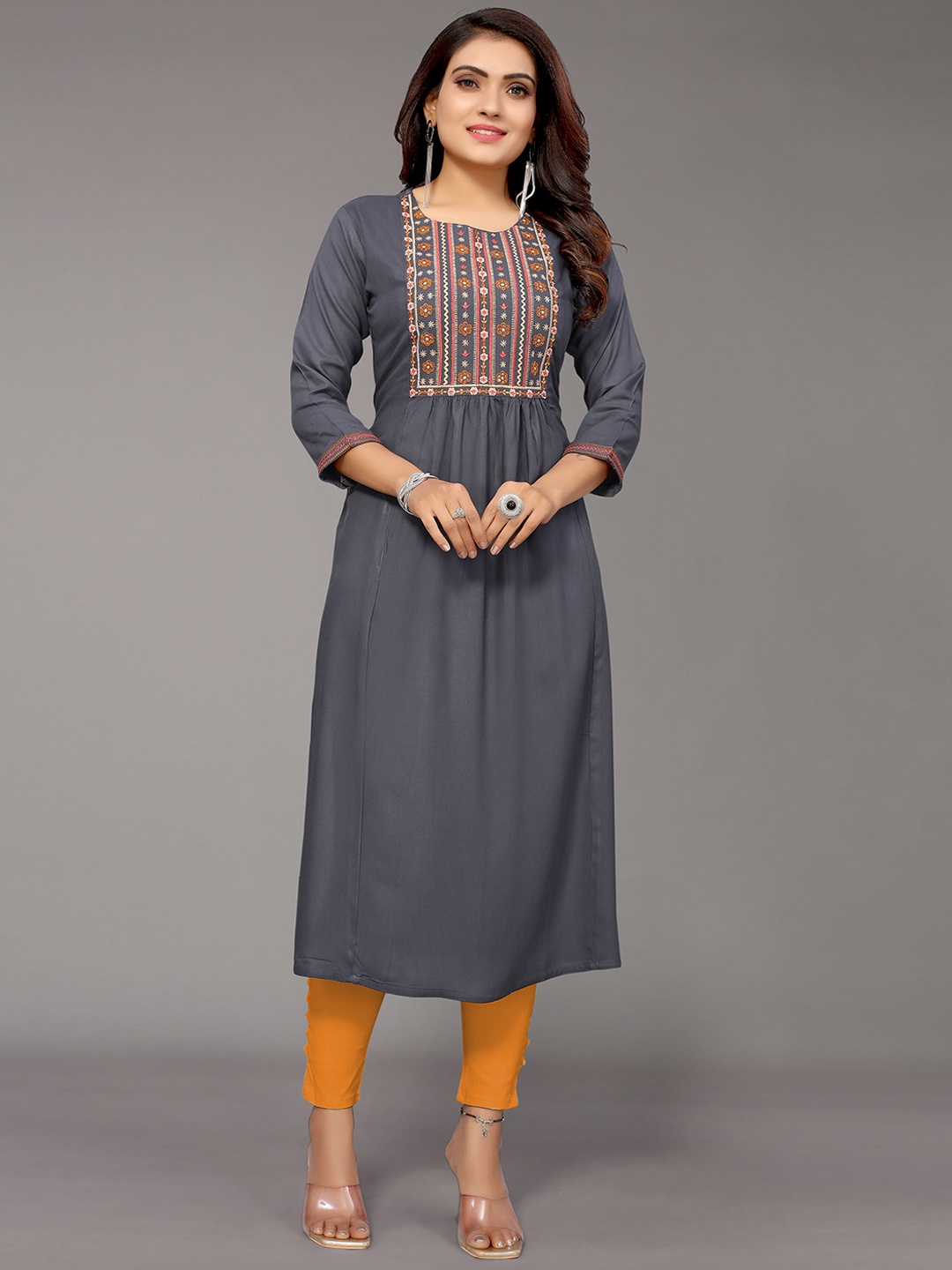 

Nimayaa Women Grey & Mustard Yellow Geometric Embroidered Round Neck Kurta