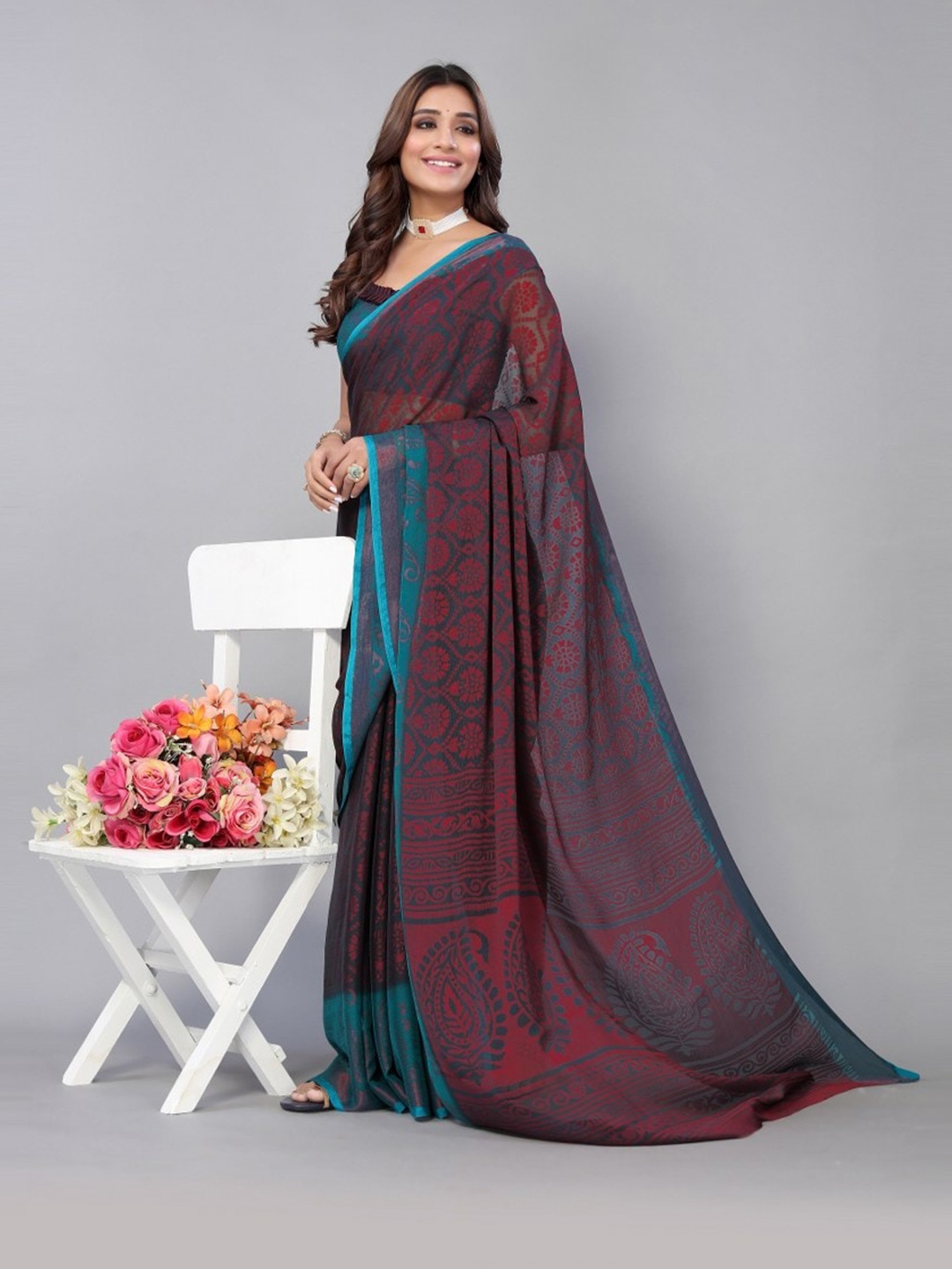

KALINI Maroon & Blue Ethnic Motifs Saree