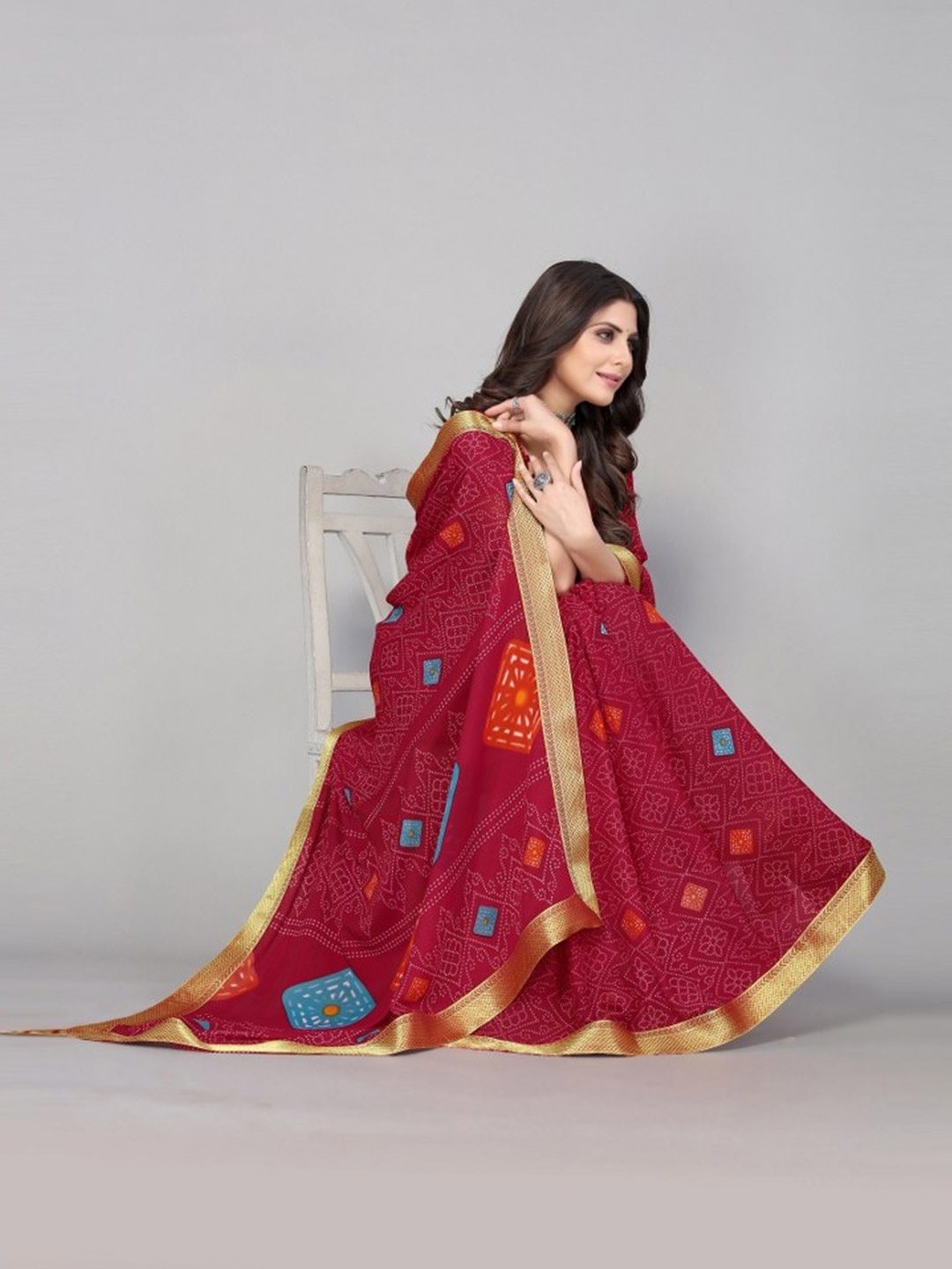

KALINI Maroon & Blue Printed Bandhani Saree