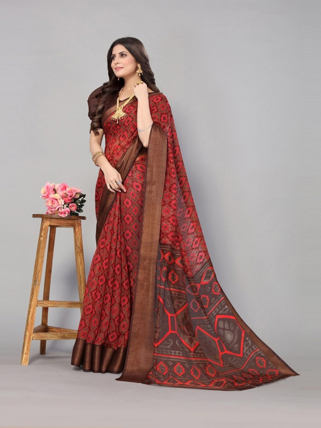 

KALINI Red & Brown Ethnic Motifs Zari Saree