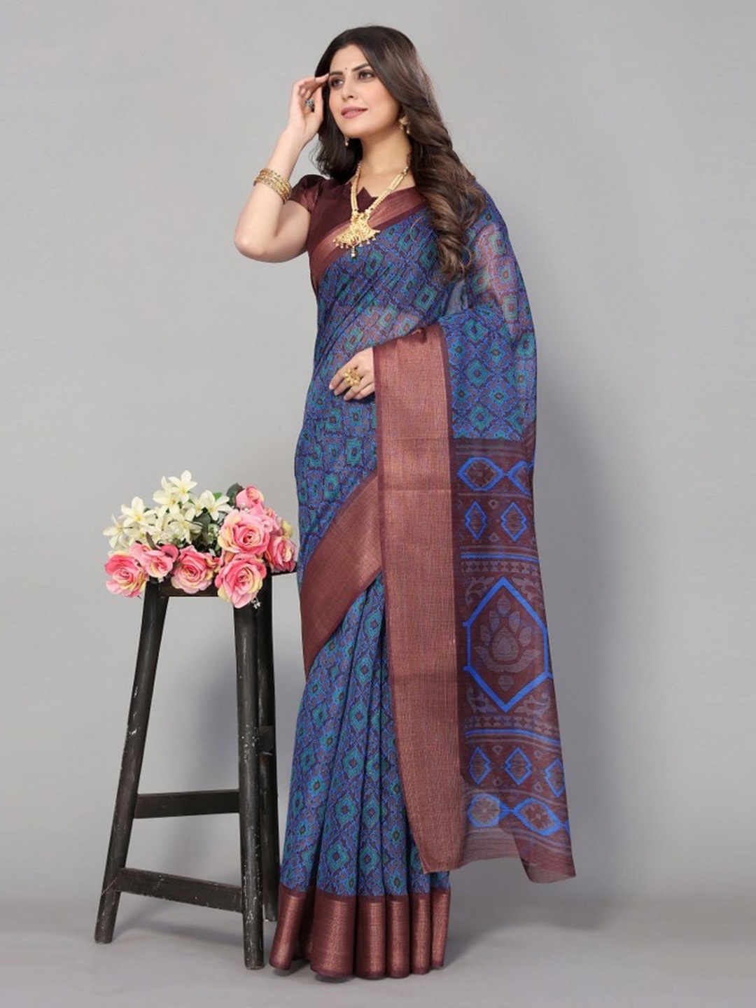 

KALINI Blue & Brown Zari Geometric Printed Saree