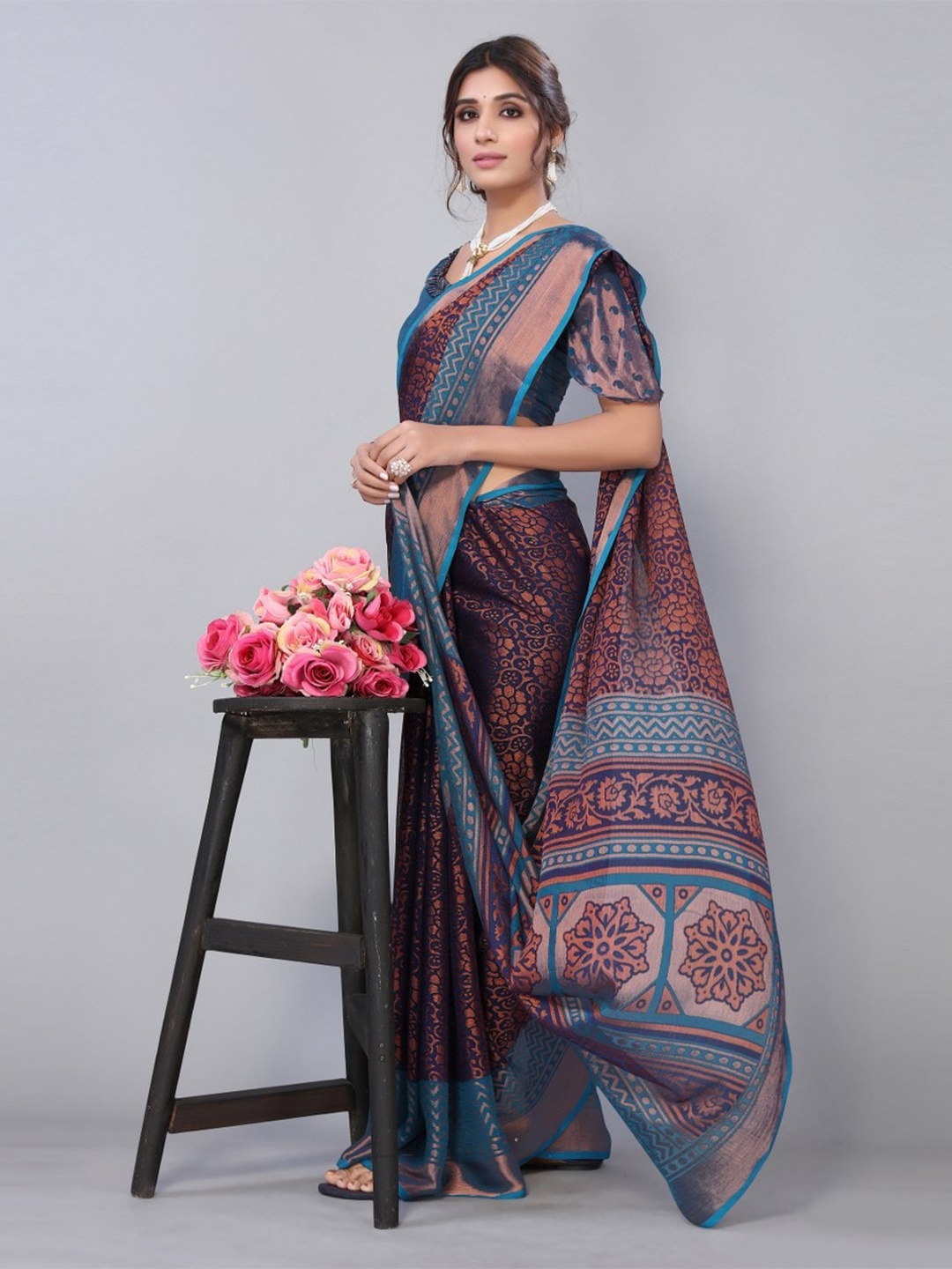 

KALINI Navy Blue & Copper-Toned Floral Printed Zari Saree