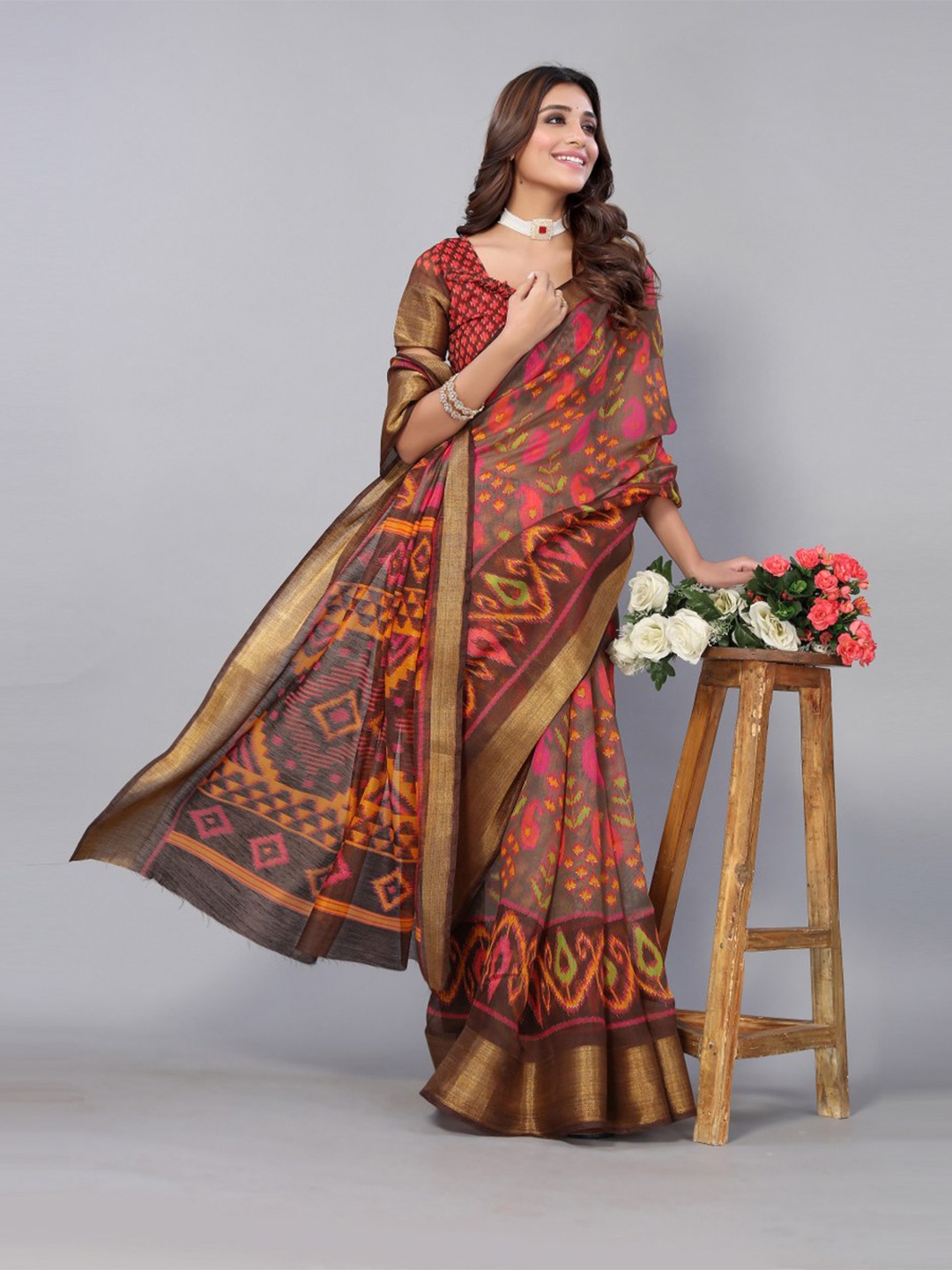 

KALINI Brown & Orange Zari Geometric Printed Saree