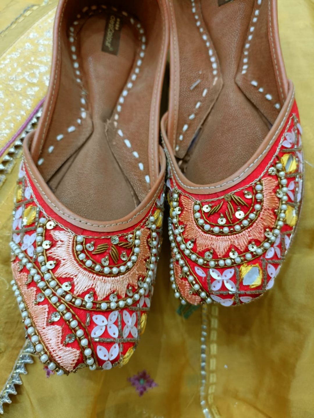 

DESI COLOUR Women Red Embellished Ethnic Mojaris Flats