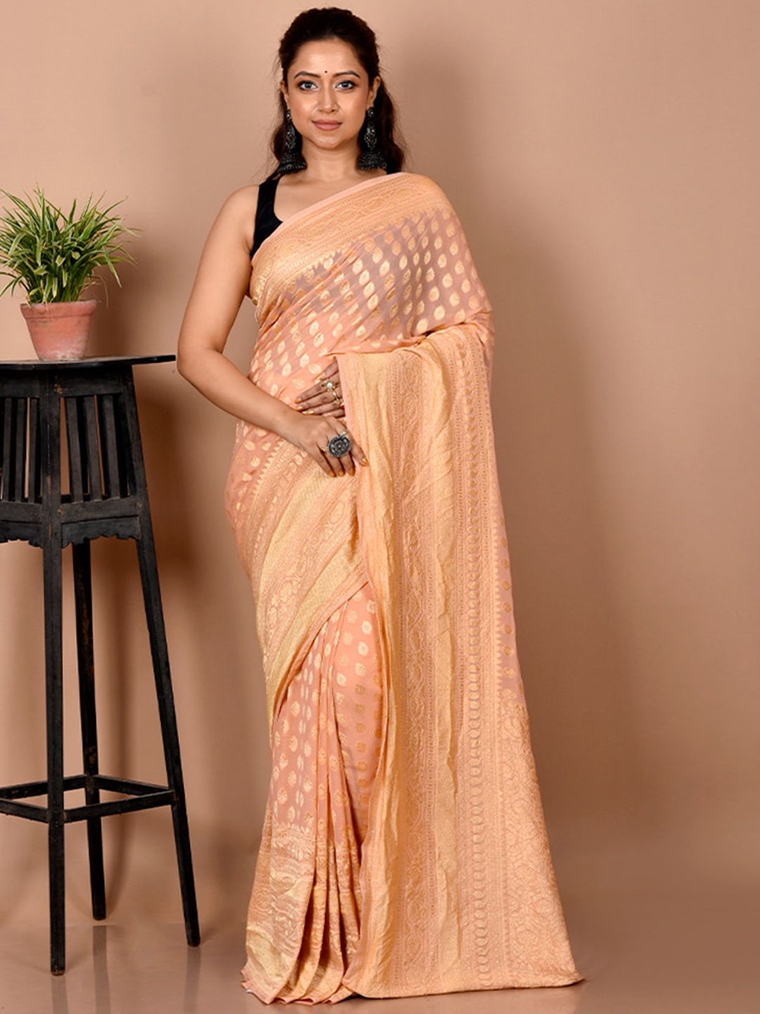 

AllSilks Peach-Coloured Woven Design Zari Pure Georgette Saree