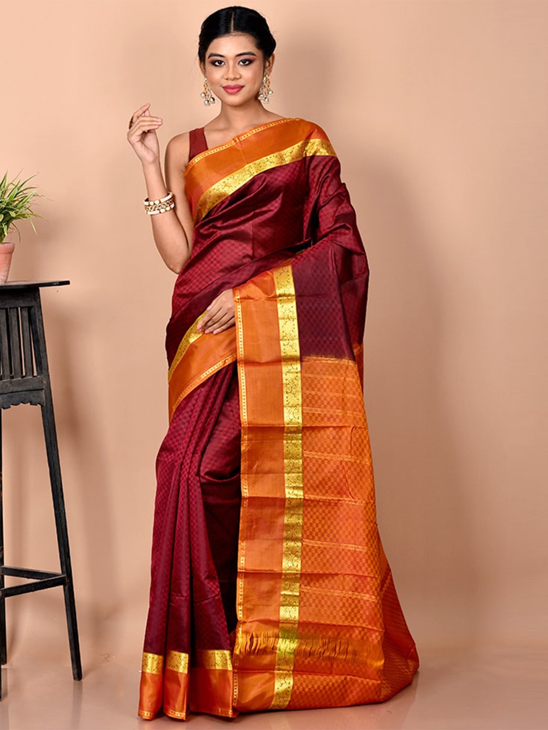 

AllSilks Maroon & Gold-Toned Woven Design Zari Silk Blend Kanjeevaram Saree