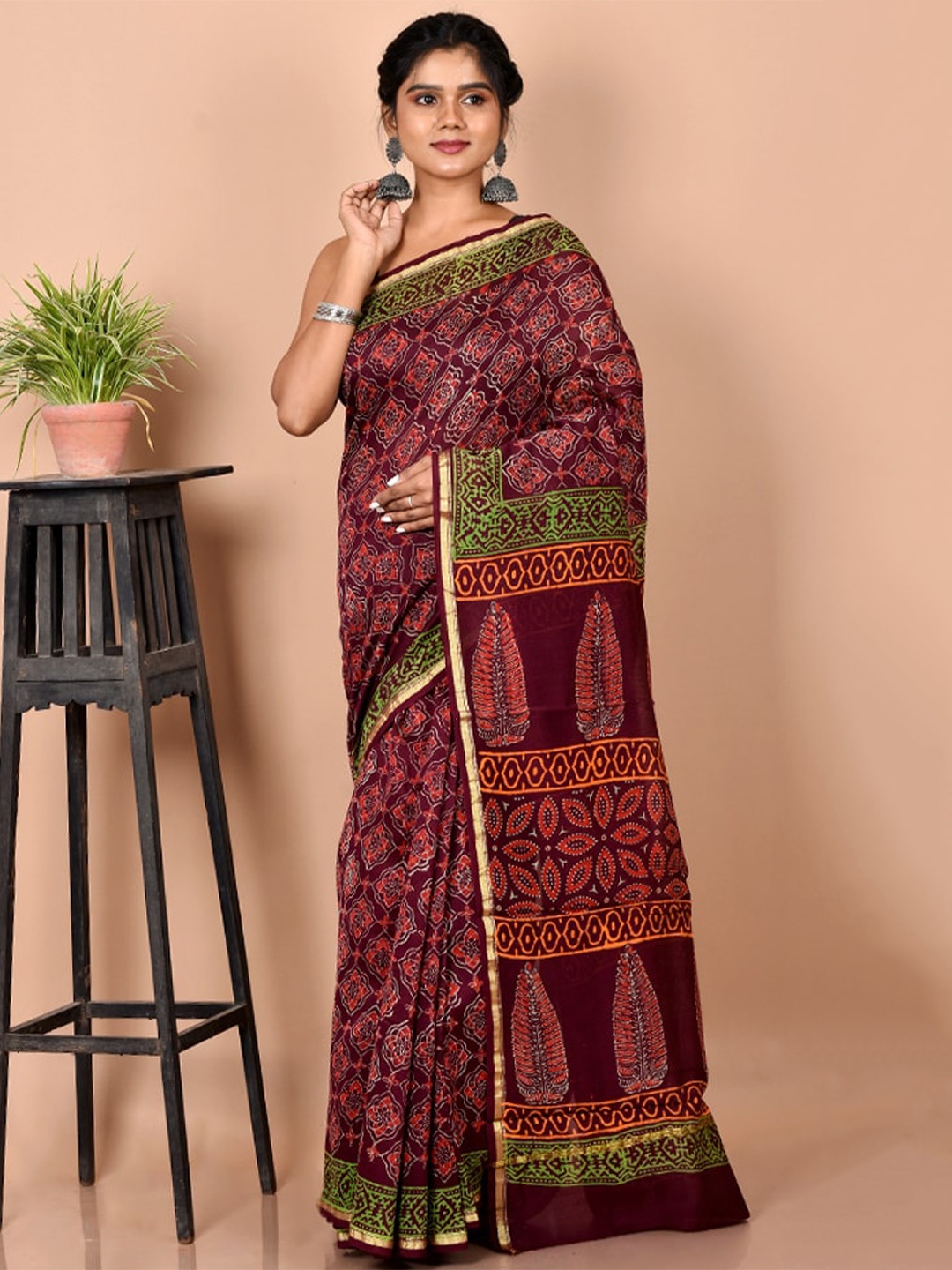 

AllSilks Maroon & Green Ethnic Motifs Zari Silk Blend Chanderi Saree