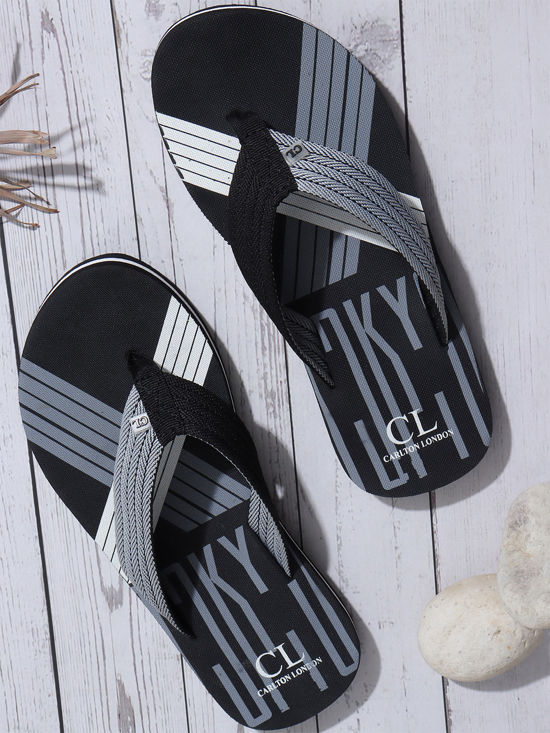 

Carlton London Men Black & White Printed Thong Flip-Flops