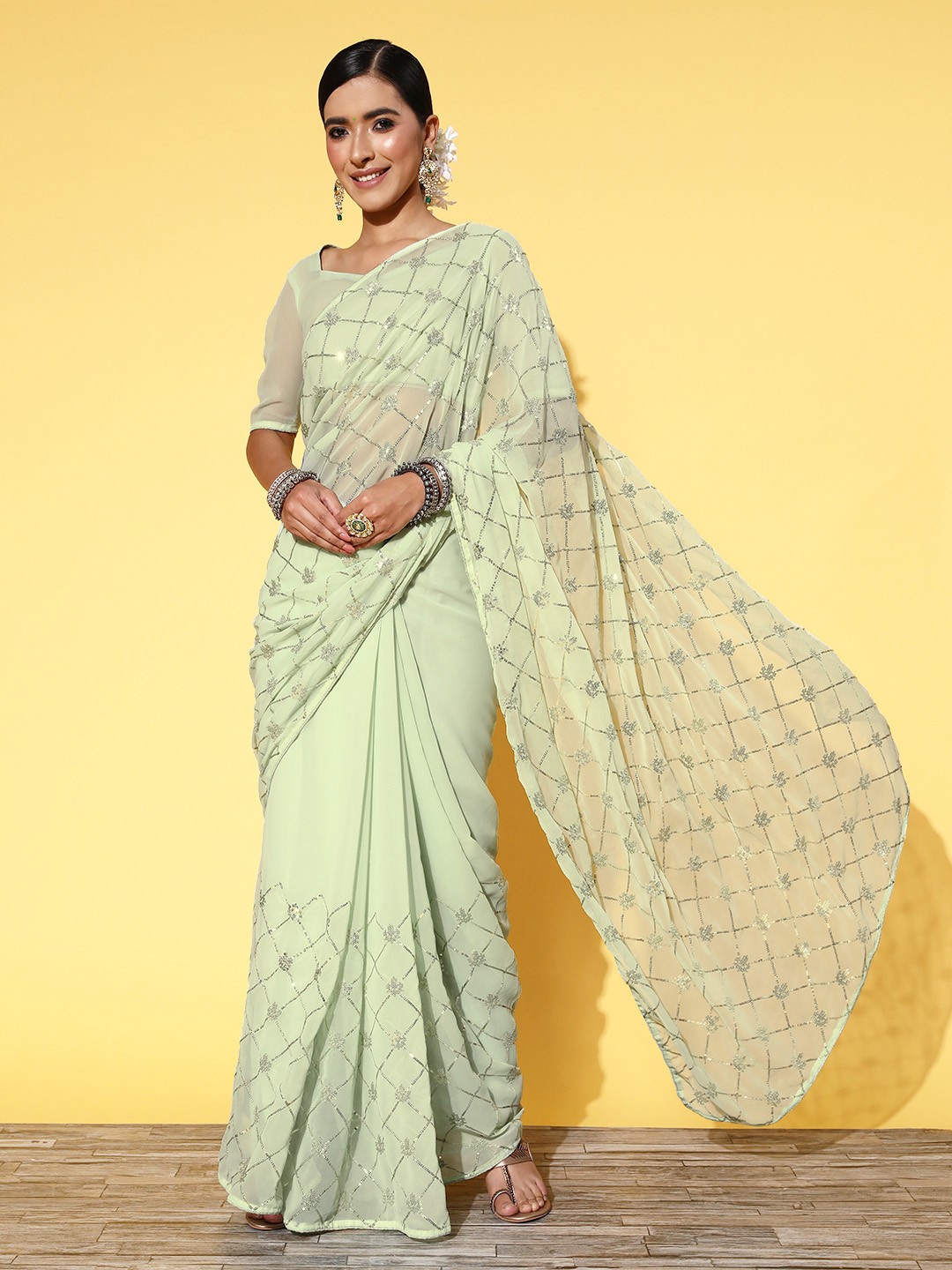 

Satrani Green Embellished Sequinned Saree