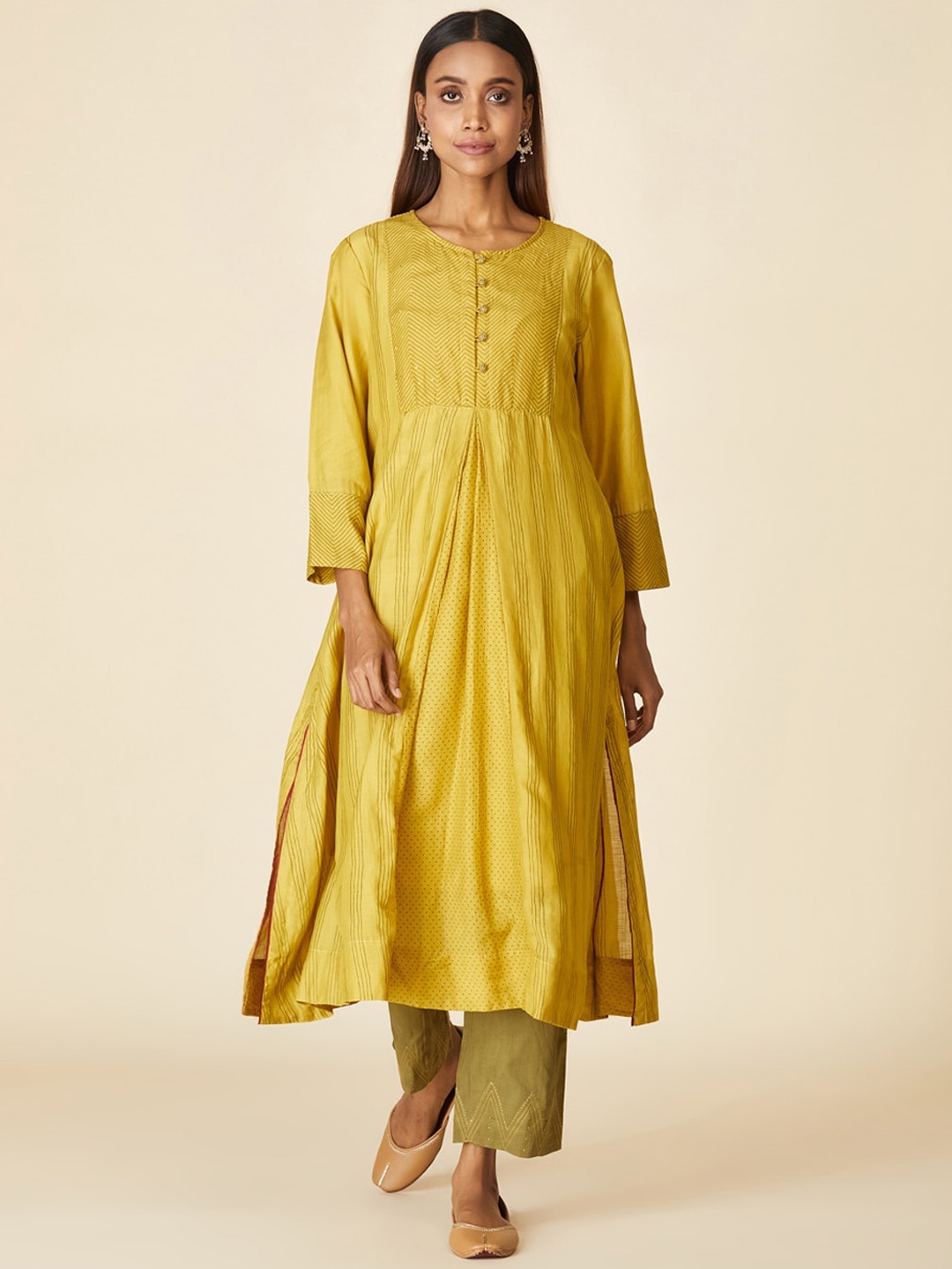 

Fabindia Women Yellow Embroidered Kurta with Trousers