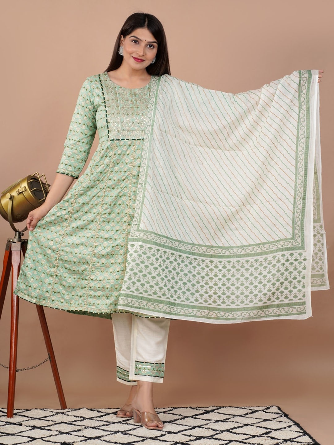 

UNISETS Green Floral Printed Panelled Sequinned Kurta with Trousers & With Dupatta