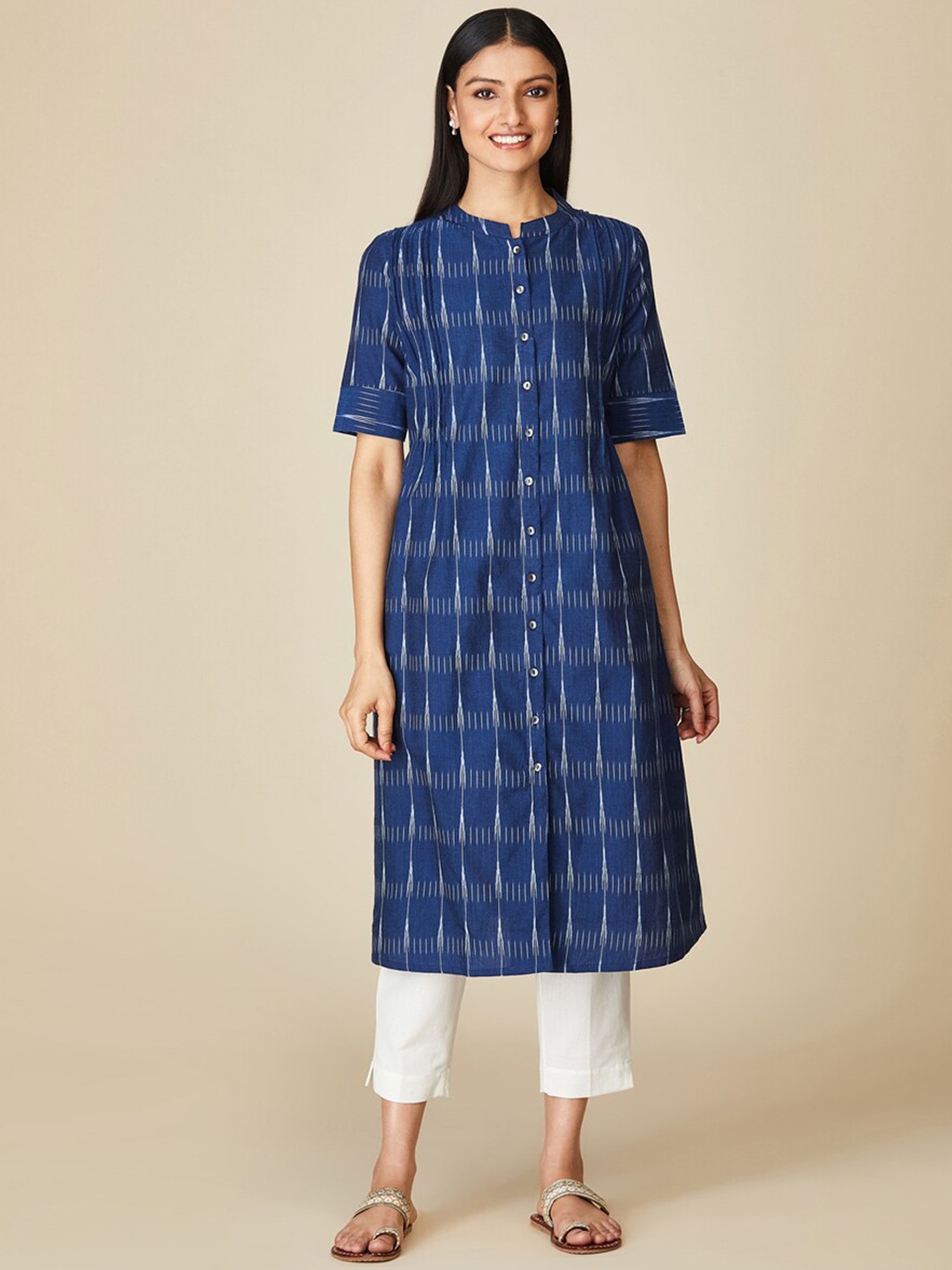 

Fabindia Navy Blue Geometric Printed Flared Sleeves Thread Work Indie Prints Cotton Kurta