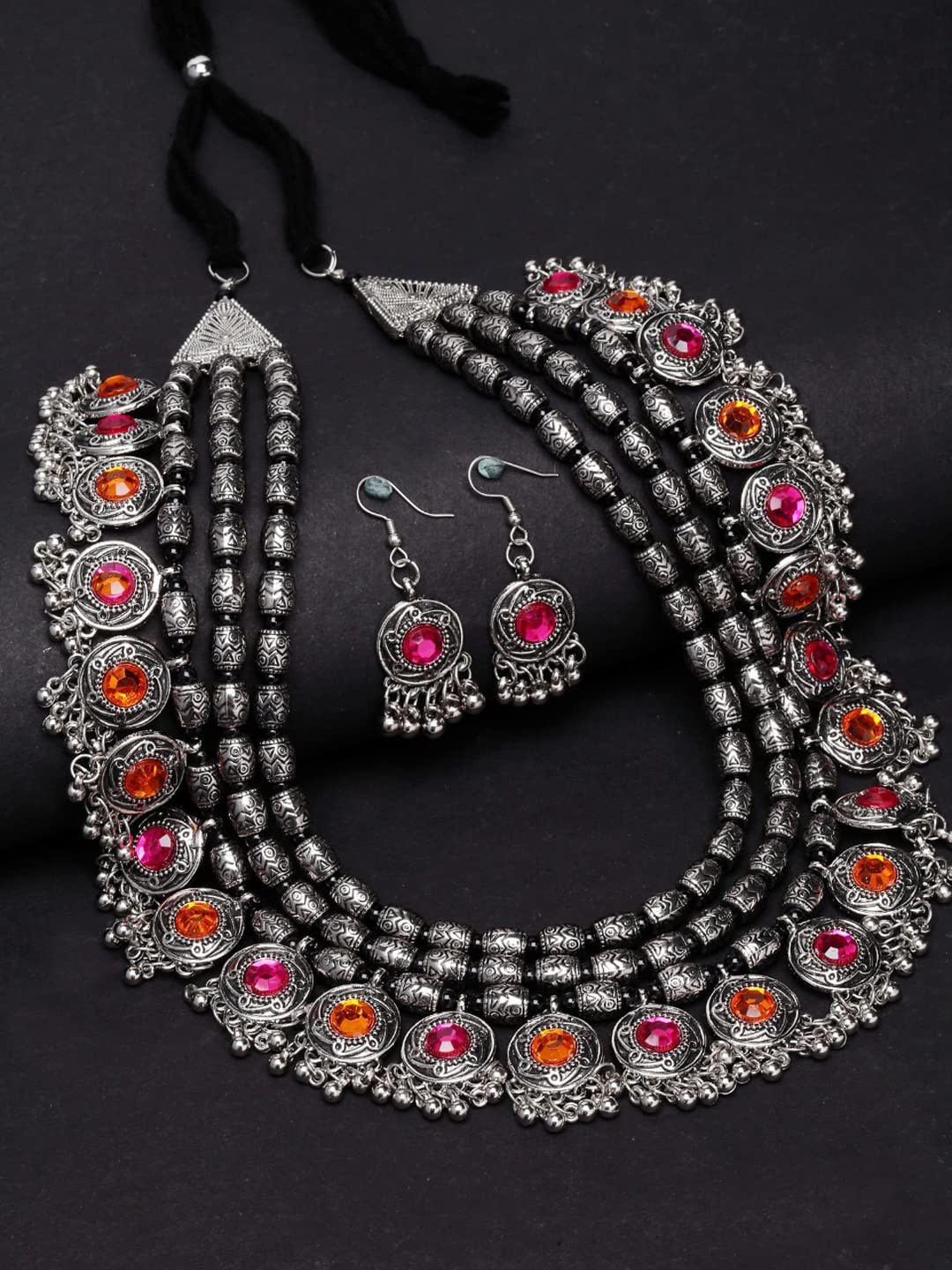 

Krelin Women Silver-Plated Orange-colored & Pink Kundan-Studded Oxidised Jewellery Set