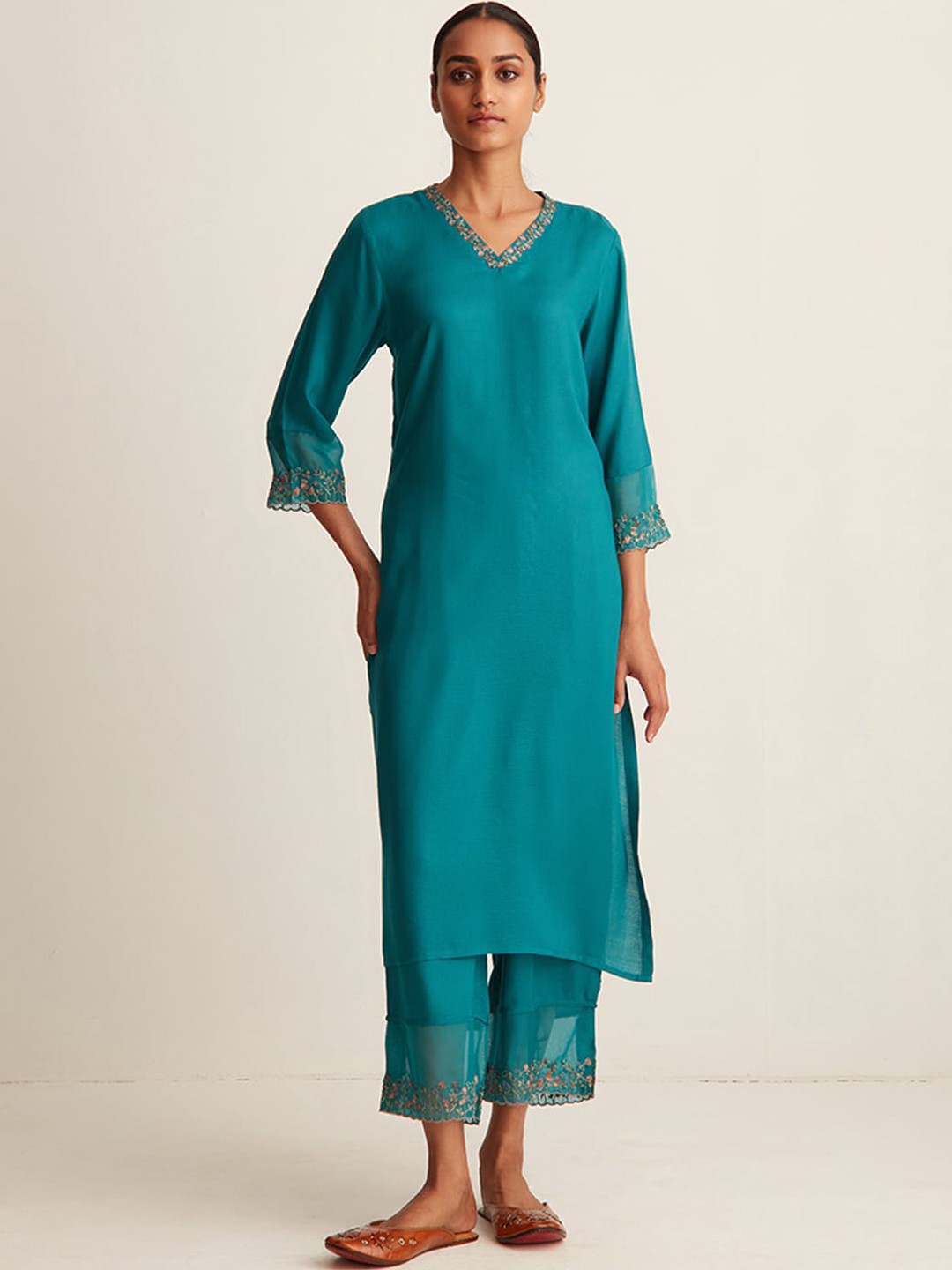 

Ancestry Teal Embroidered V Neck Kurta