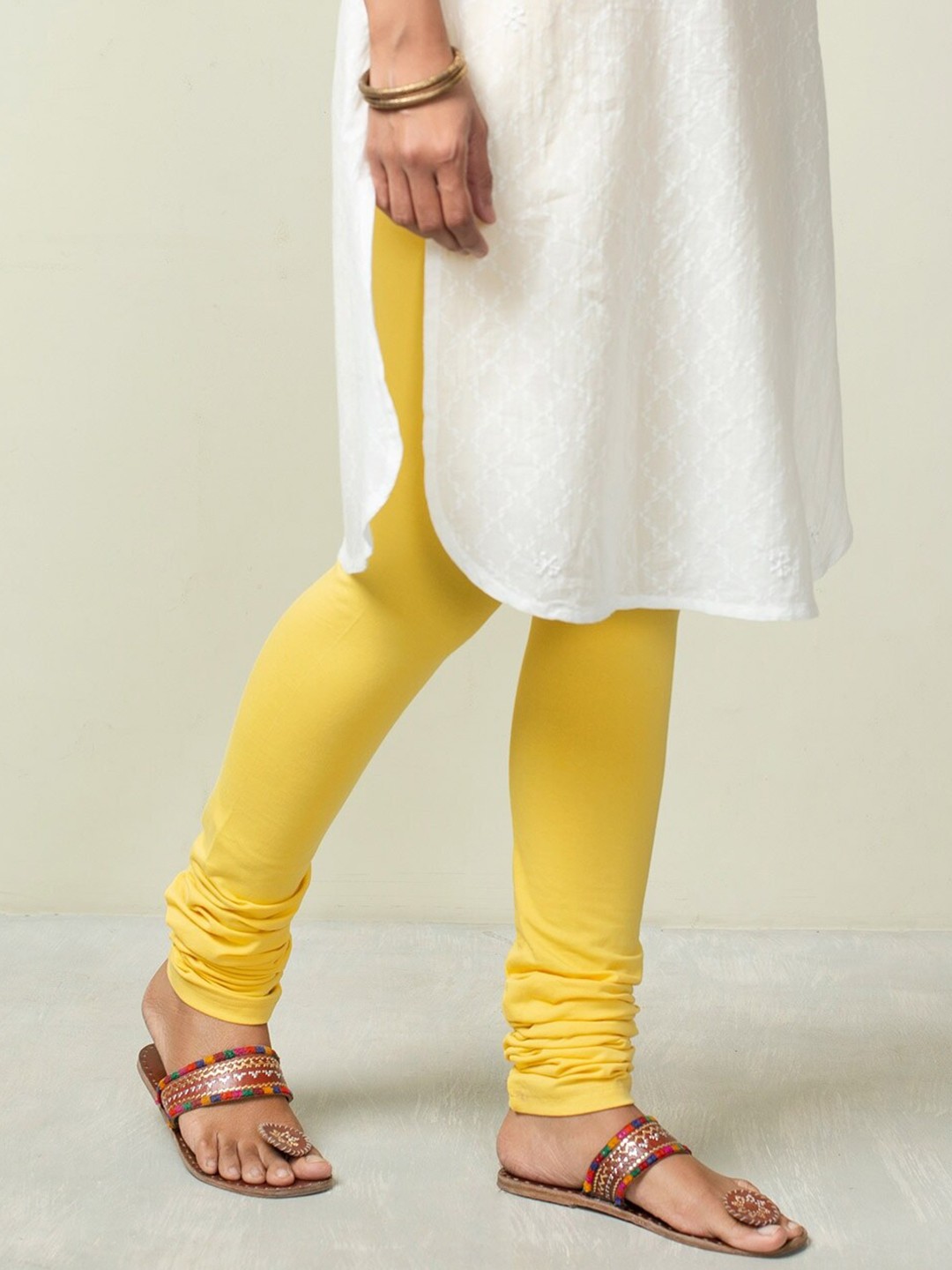 

Fabindia Women Yellow Cotton Solid Slim Fit Churidar