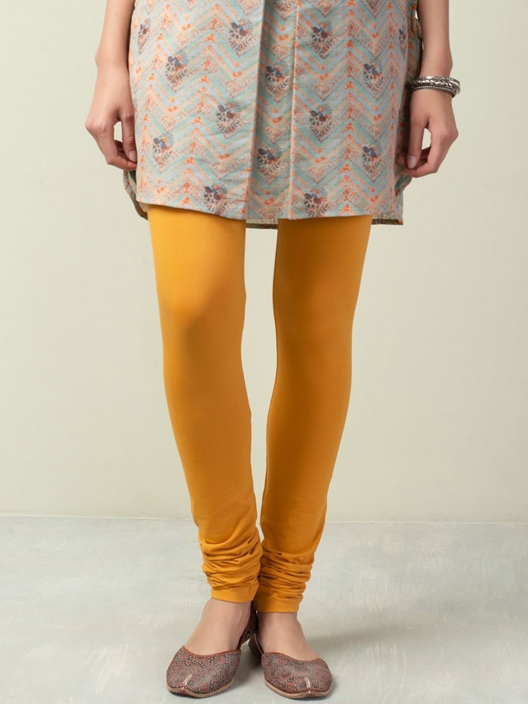 

Fabindia Women Mustard Cotton Slim-Fit Churidar