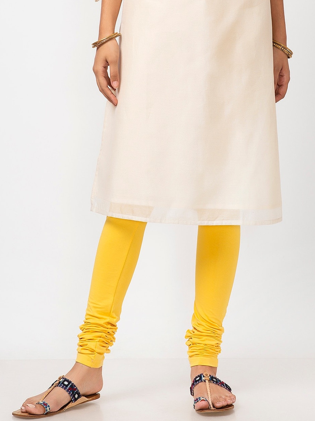 

Fabindia Women Yellow Cotton Solid Slim Fit Churidar