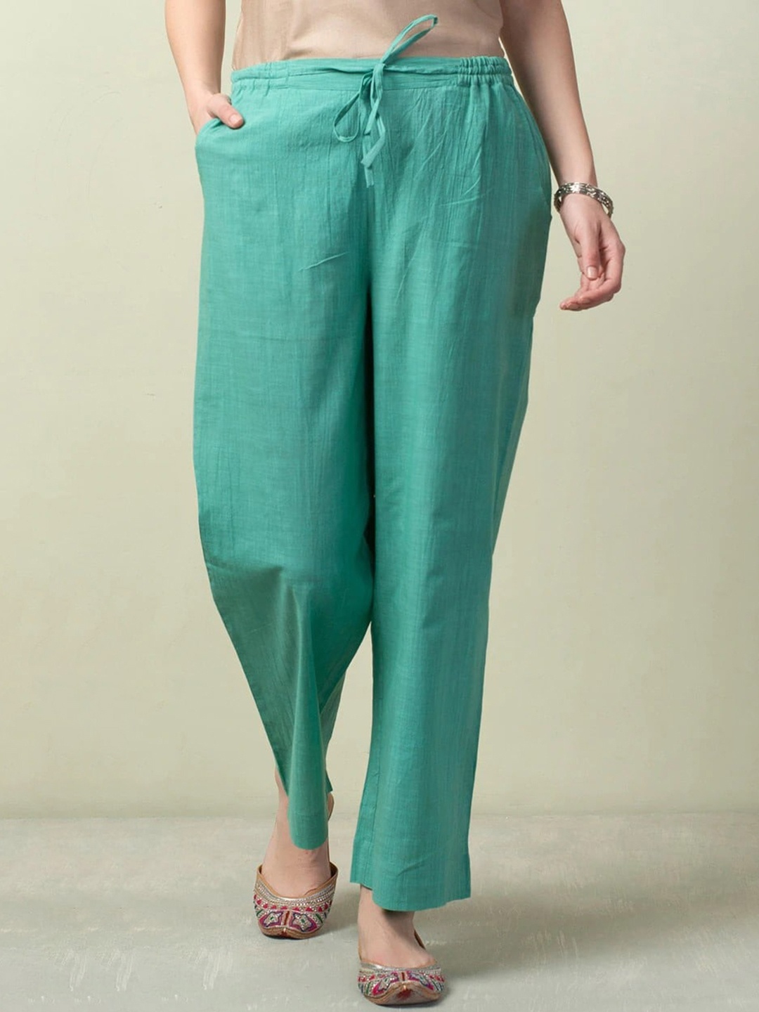 

Fabindia Women Comfort Pleated Cotton Trousers, Green