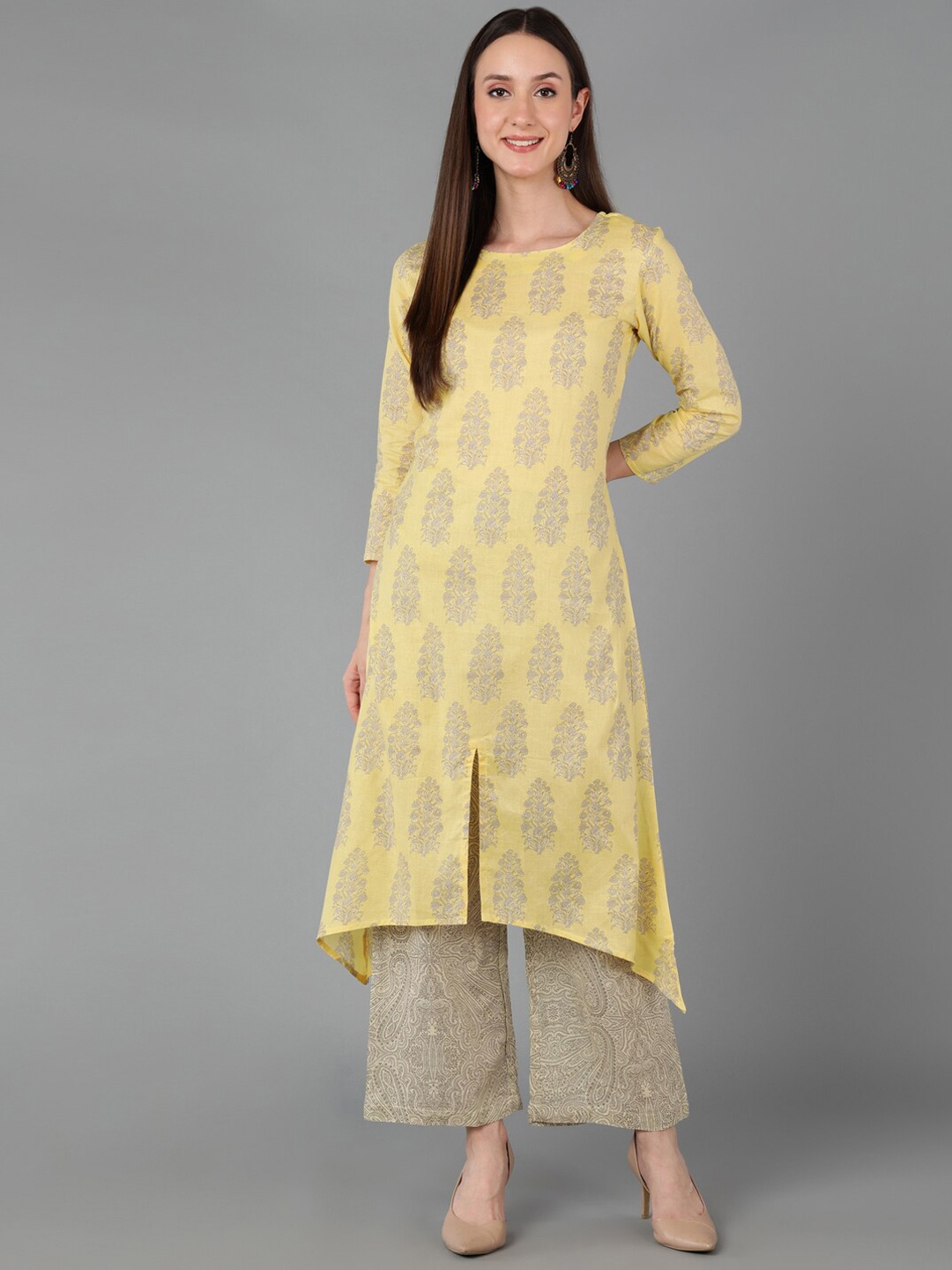 

AHIKA Women Yellow Ethnic Motifs Printed Empire Pure Cotton Kurta with Palazzos
