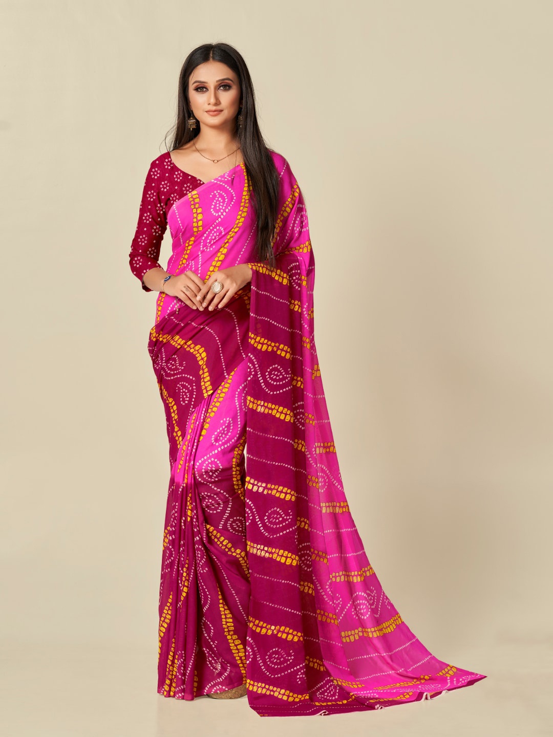 

Ambuja International Pink & Yellow Bandhani Printed Saree