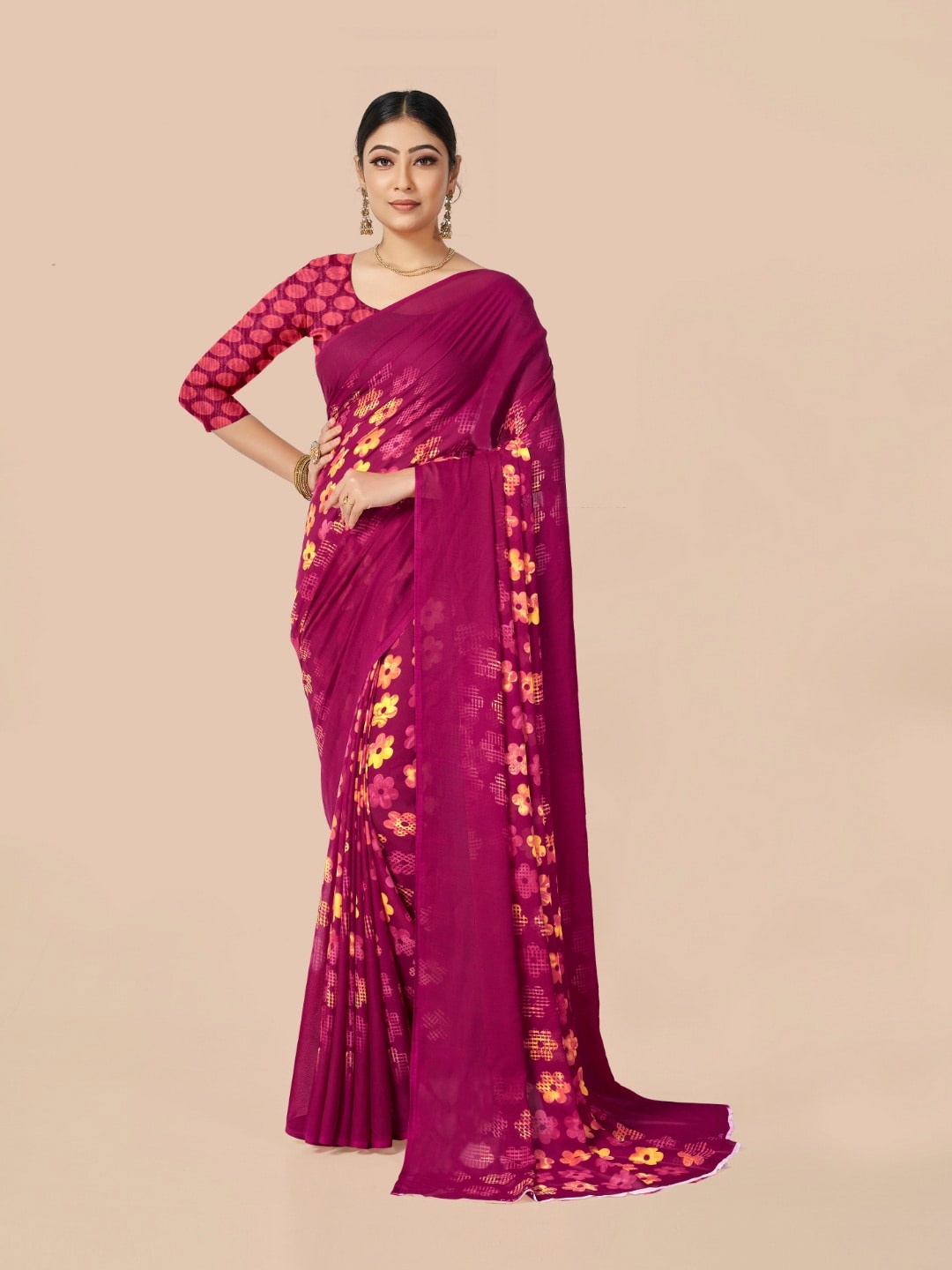 

Ambuja International Magenta & Yellow Floral Printed Saree