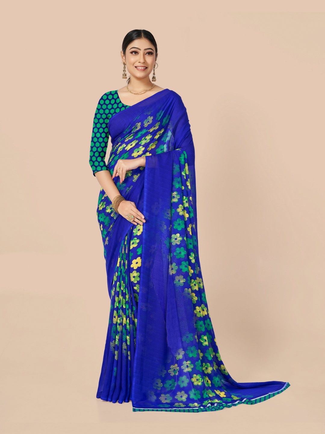 

Ambuja International Blue & Green Floral Printed Saree