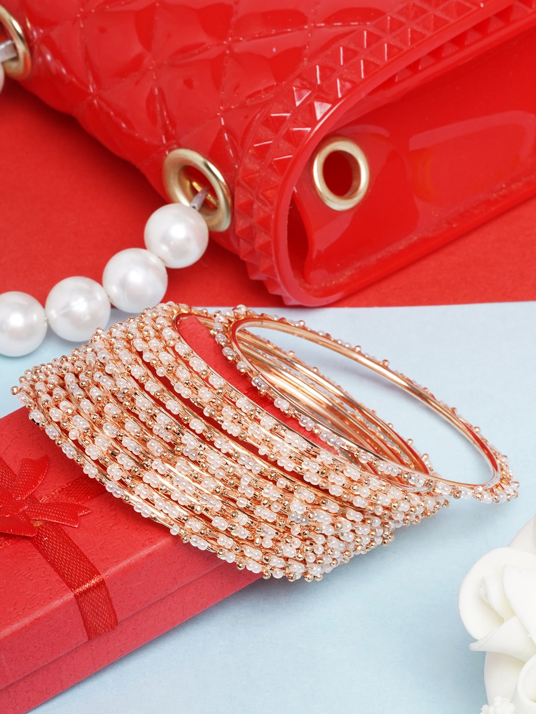 

DIVA WALK Women Gold-Toned & White Set of 12 Gold-Plated Beaded Bangles