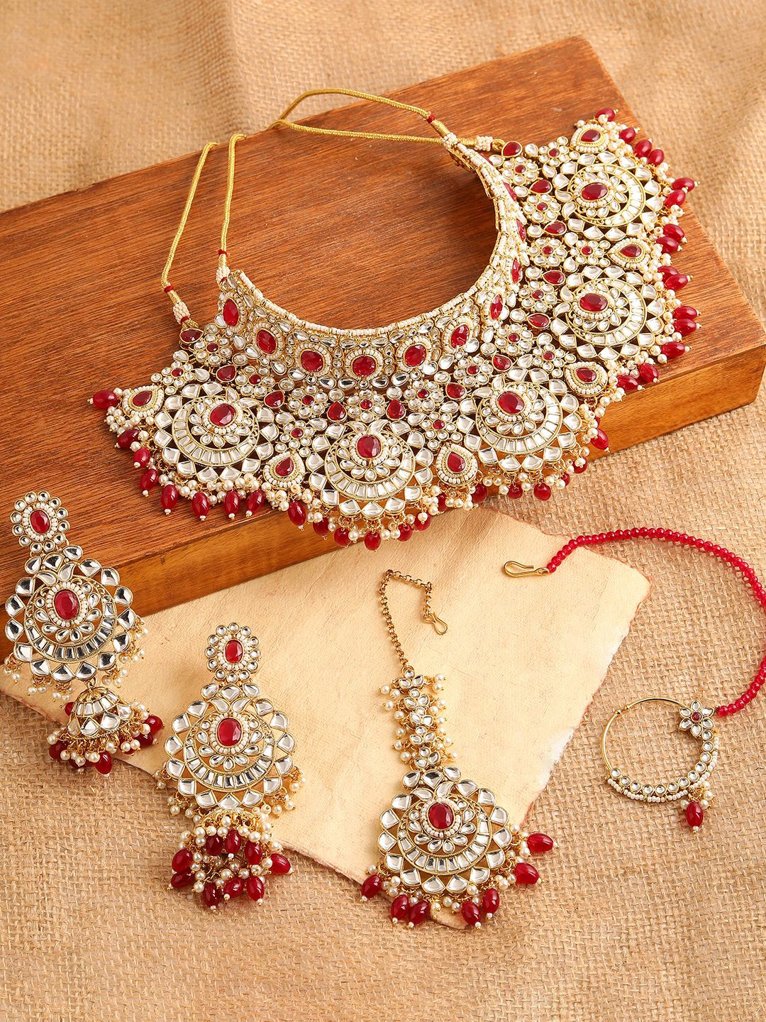 

SOHI Gold-Plated Red Kndan Studded Jewellery Set