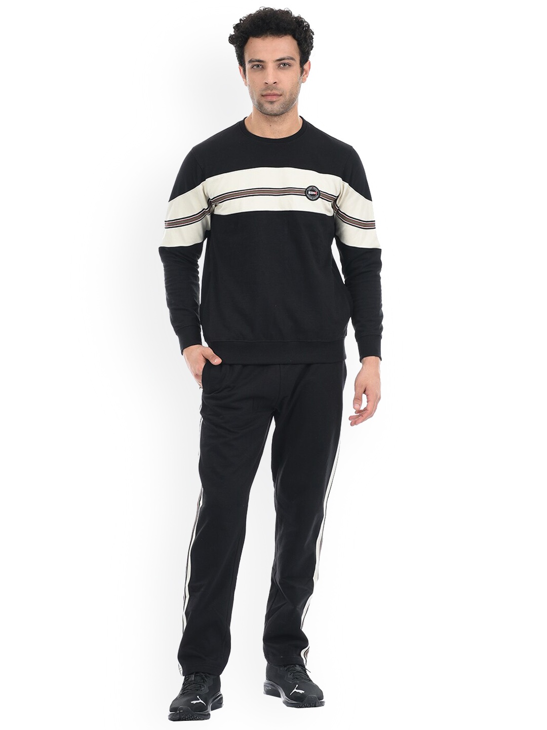 

Cloak & Decker by Monte Carlo Men Black & Off White Colorblocked Tracksuits