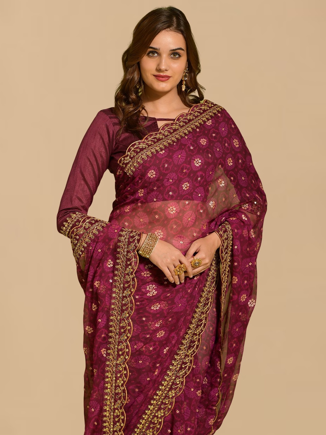 

Sangria Burgundy Beads and Stones Pure Georgette Saree